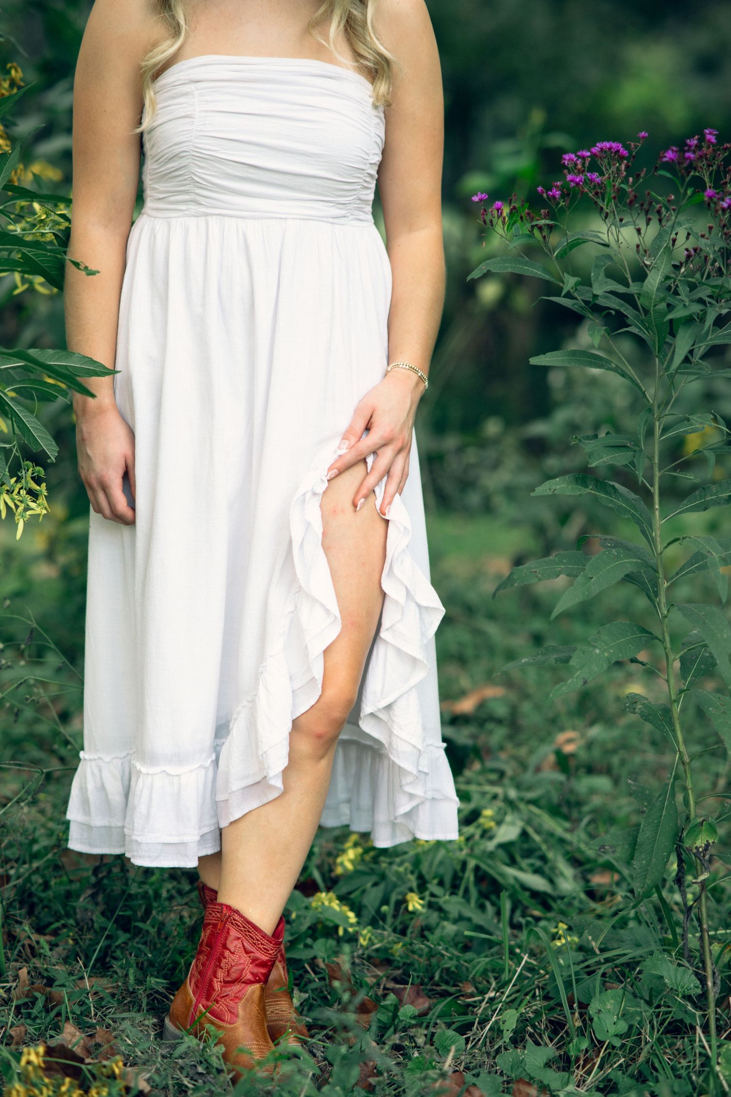 White dress with red boots at the farm for this senior outfit.