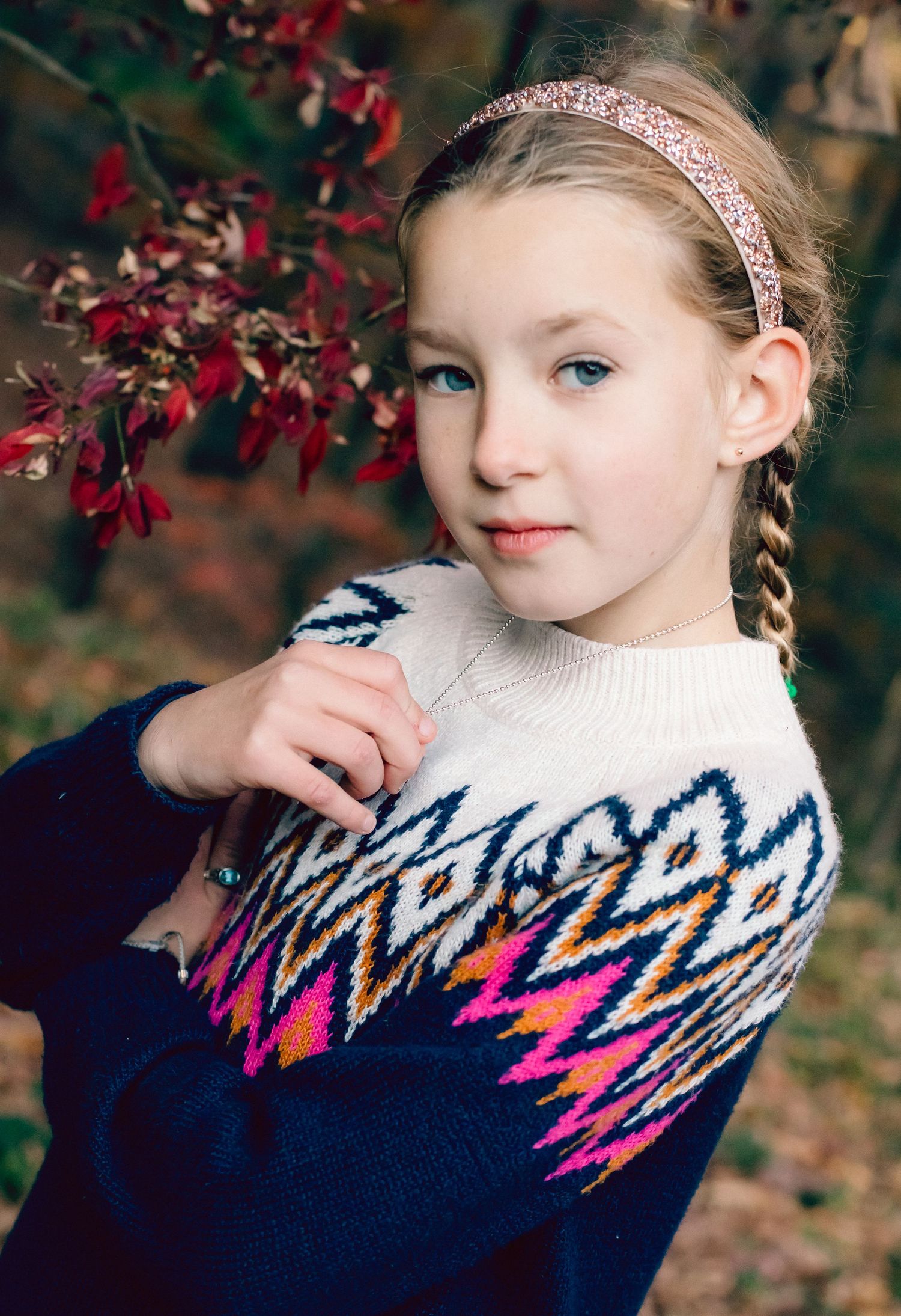 Fall Portrait of young girl wearing the cutest headband.