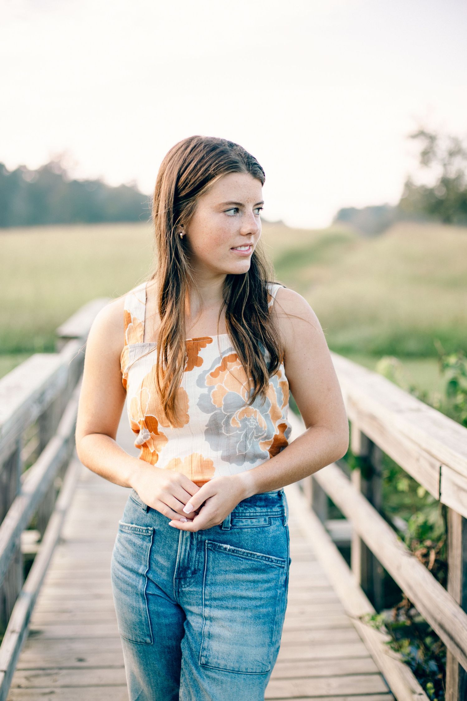 High school senior portrait posed on a bridge at Chickamauga Battlefield.