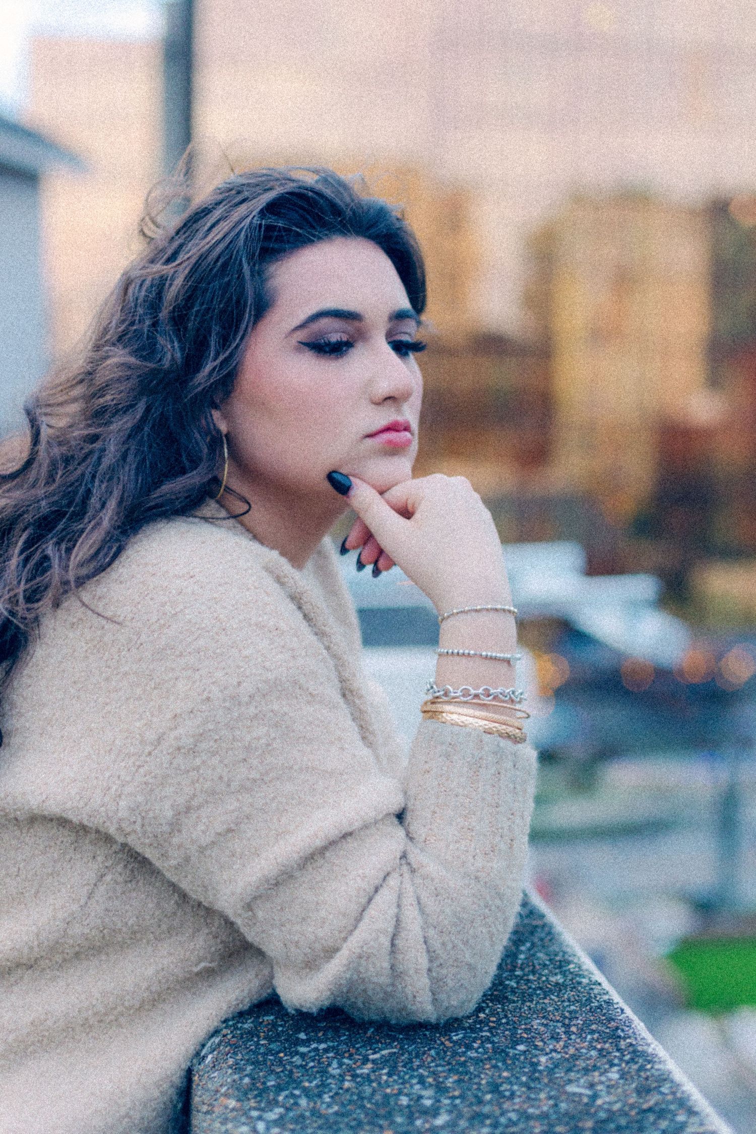 Rooftop Editorial senior portrait pose in Downtown Chattanooga, TN. at sunset.