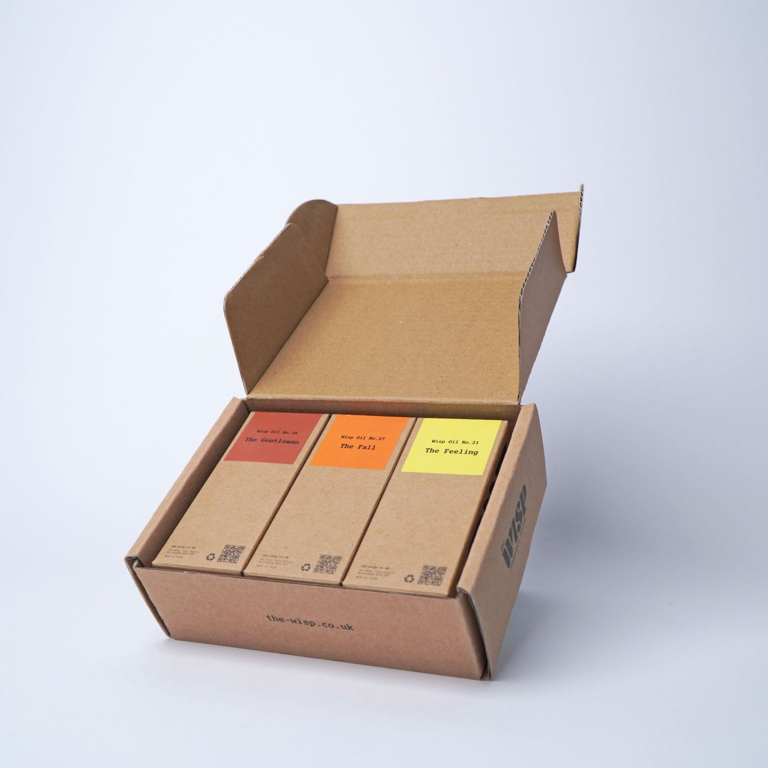Cardboard shipping box shown at different angles against white background.