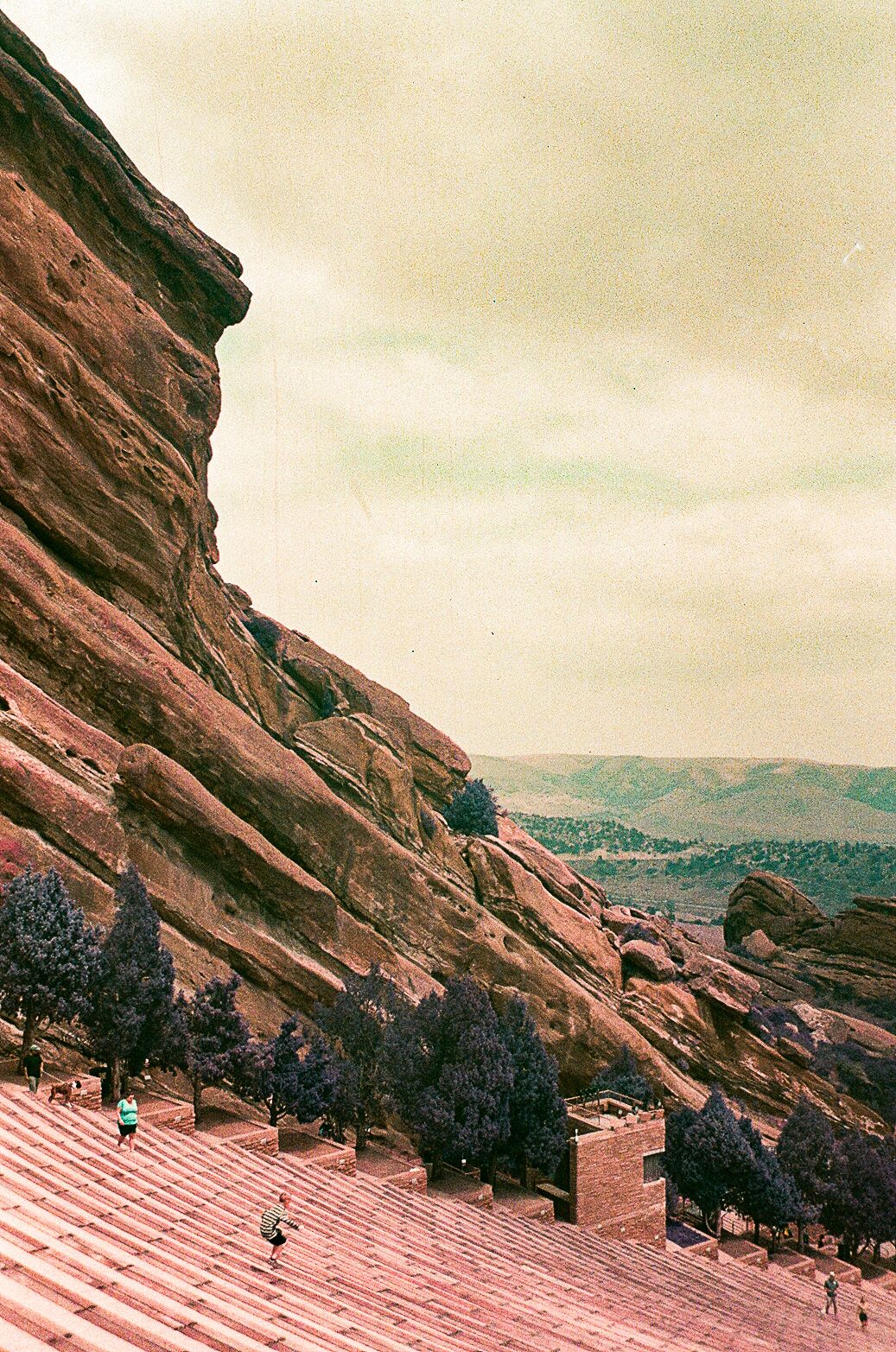 Red Rocks Amphitheatre's dramatic sandstone formations and seating area under an overcast sky.