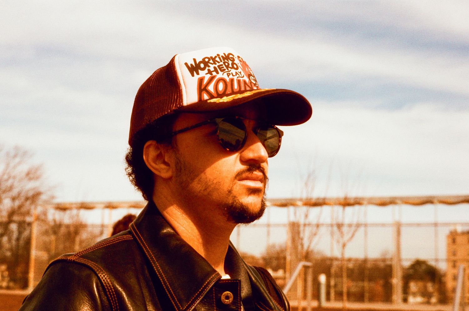 Series of warm-toned shots featuring people wearing baseball caps in sunlight.