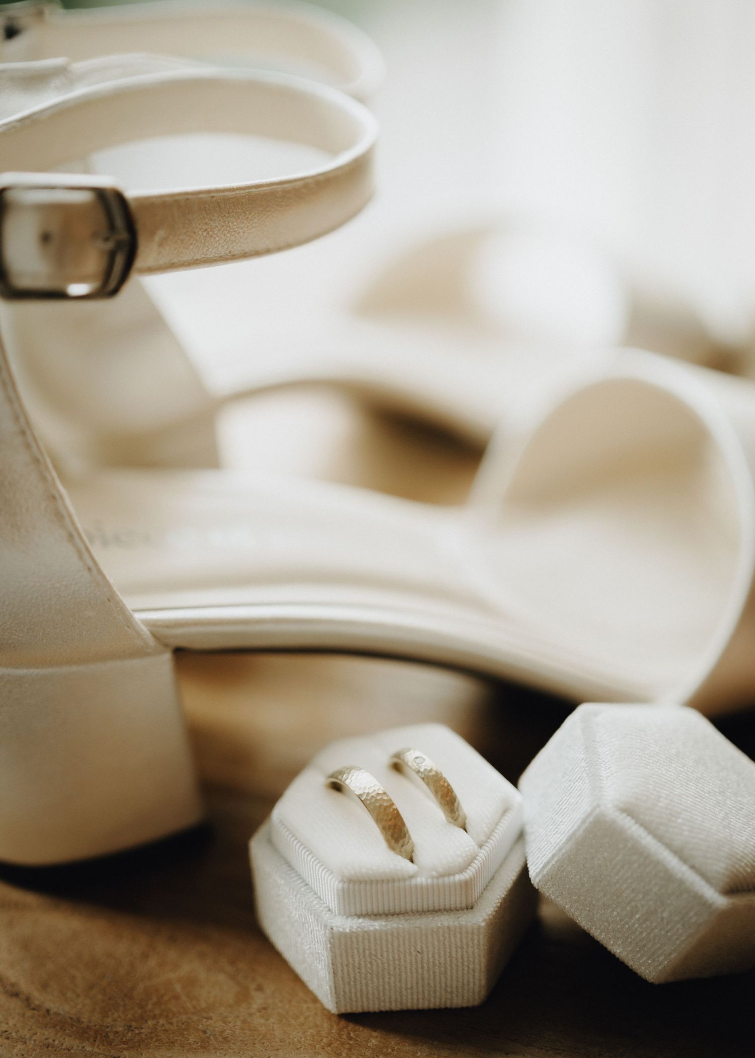 A series of close-up shots showing white bow ties arranged in a minimalist composition against a neutral background.