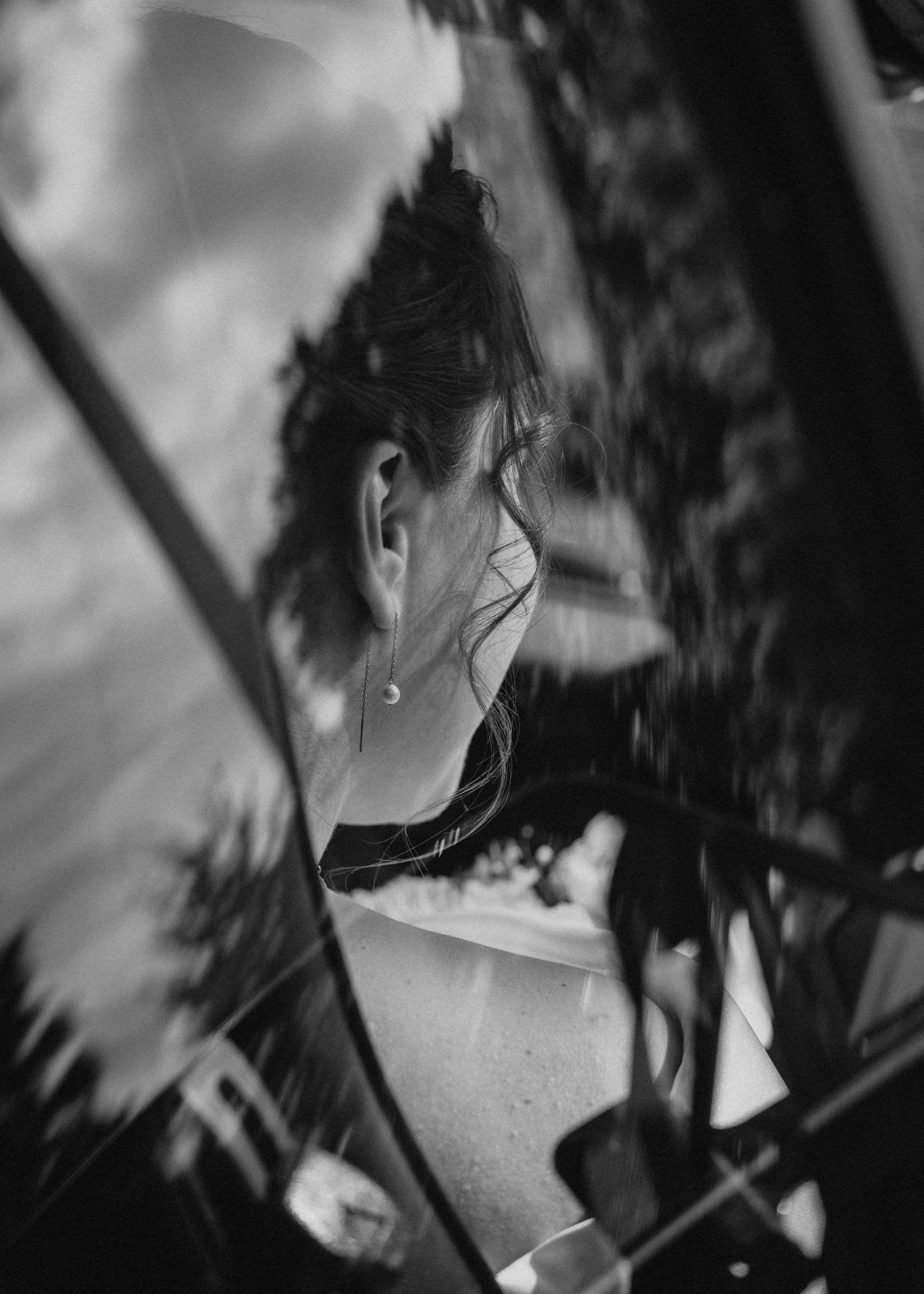 A series of black and white artistic photographs showing silhouetted figures in dramatic lighting and shadows.