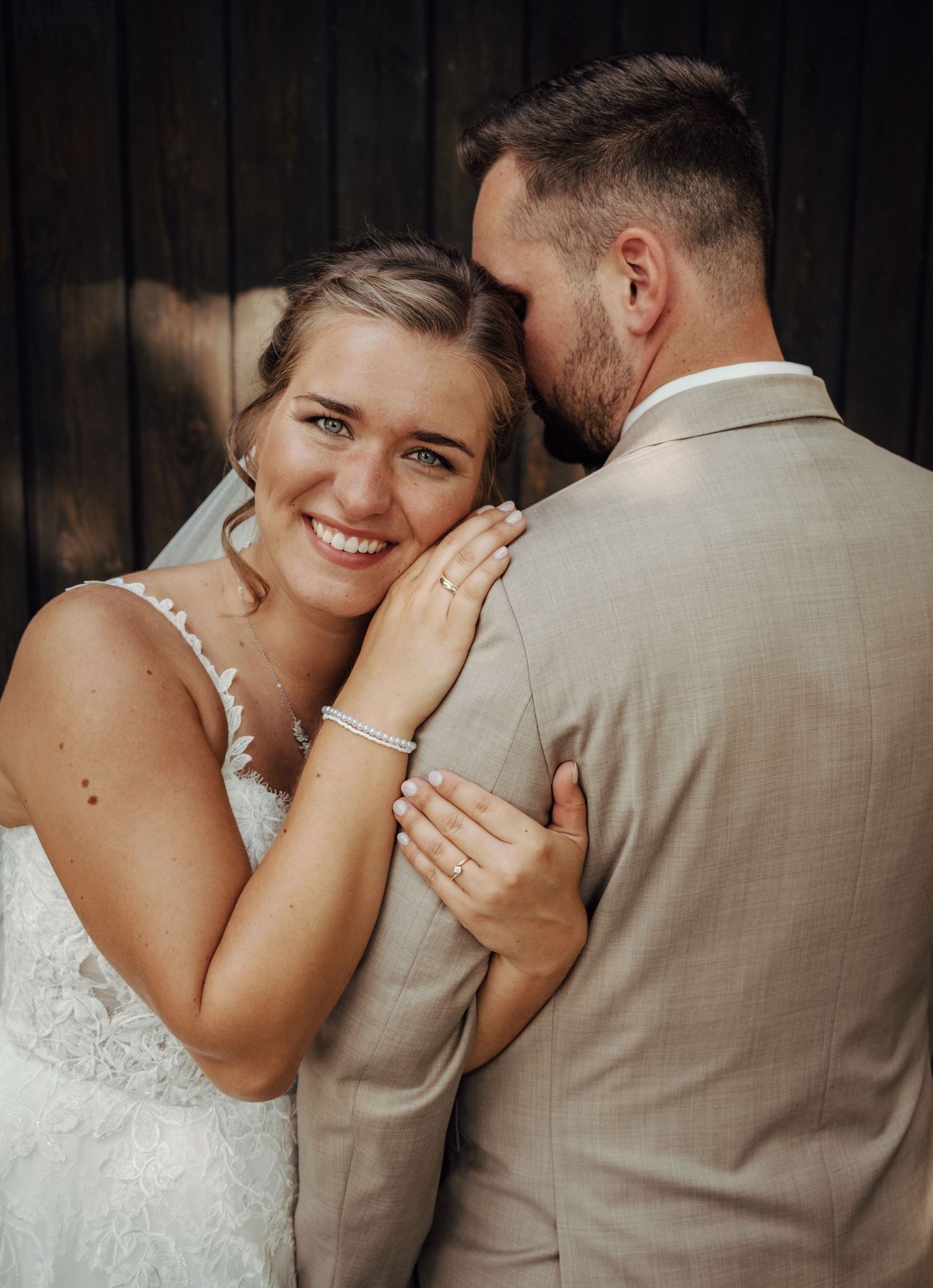 A romantic sequence of wedding photos showing tender moments between newlyweds in white dress and beige suit.