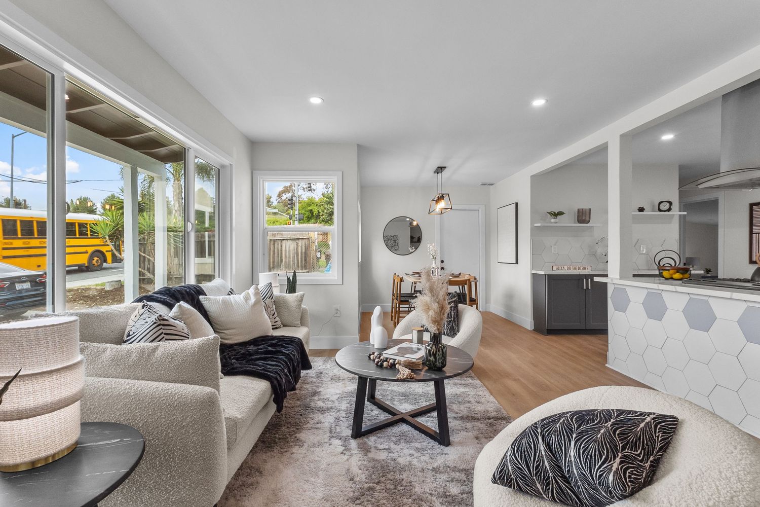 Interior shots of modern home showing living spaces with contemporary furnishings and neutral decor.