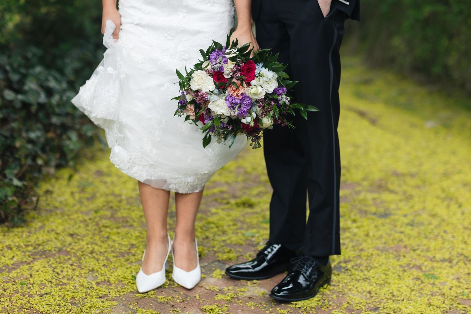 Detail shots of wedding couple's formal attire and floral bouquet.