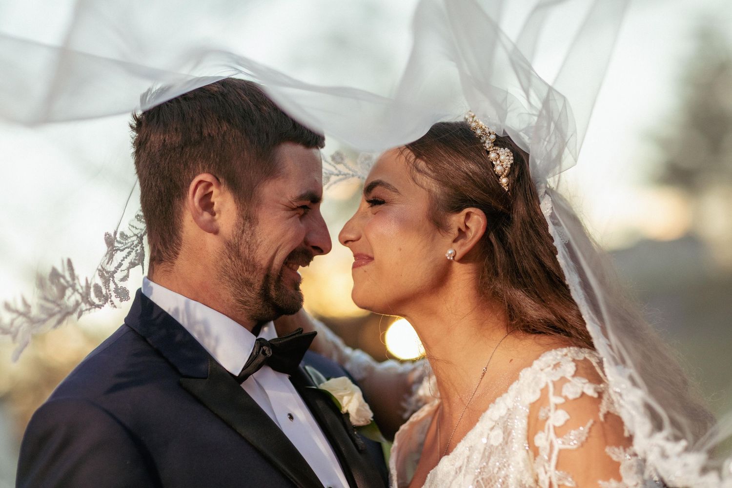 Romantic wedding couple sharing intimate moments during their special day.