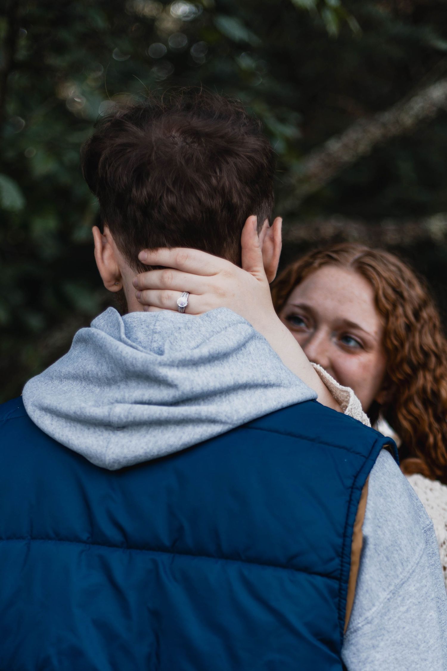 Close-up shots of a couple sharing intimate moments in a natural outdoor setting.