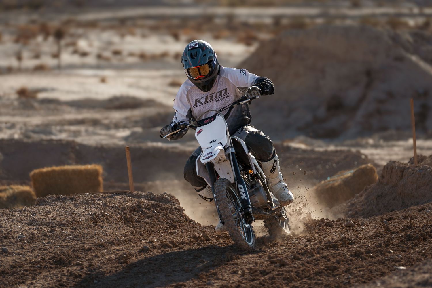 Outdoor photography of a dirt bike rider at an OHV park captured by Oasis Digital.