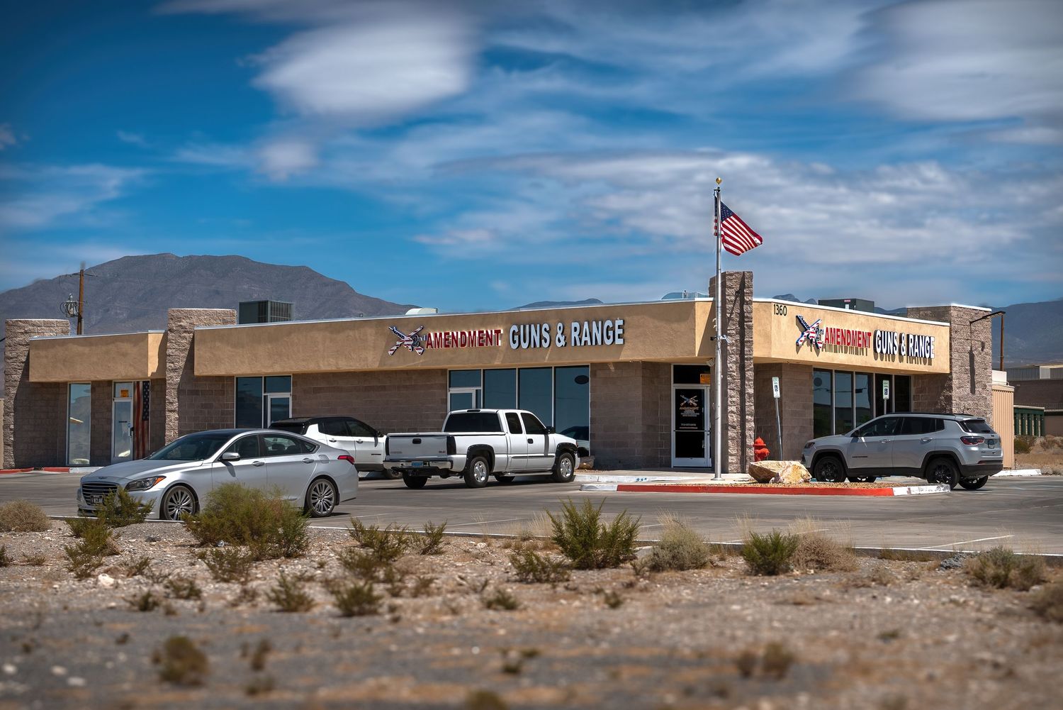 Professional commercial photography of a Pahrump Nevada gun store exterior by Oasis Digital.