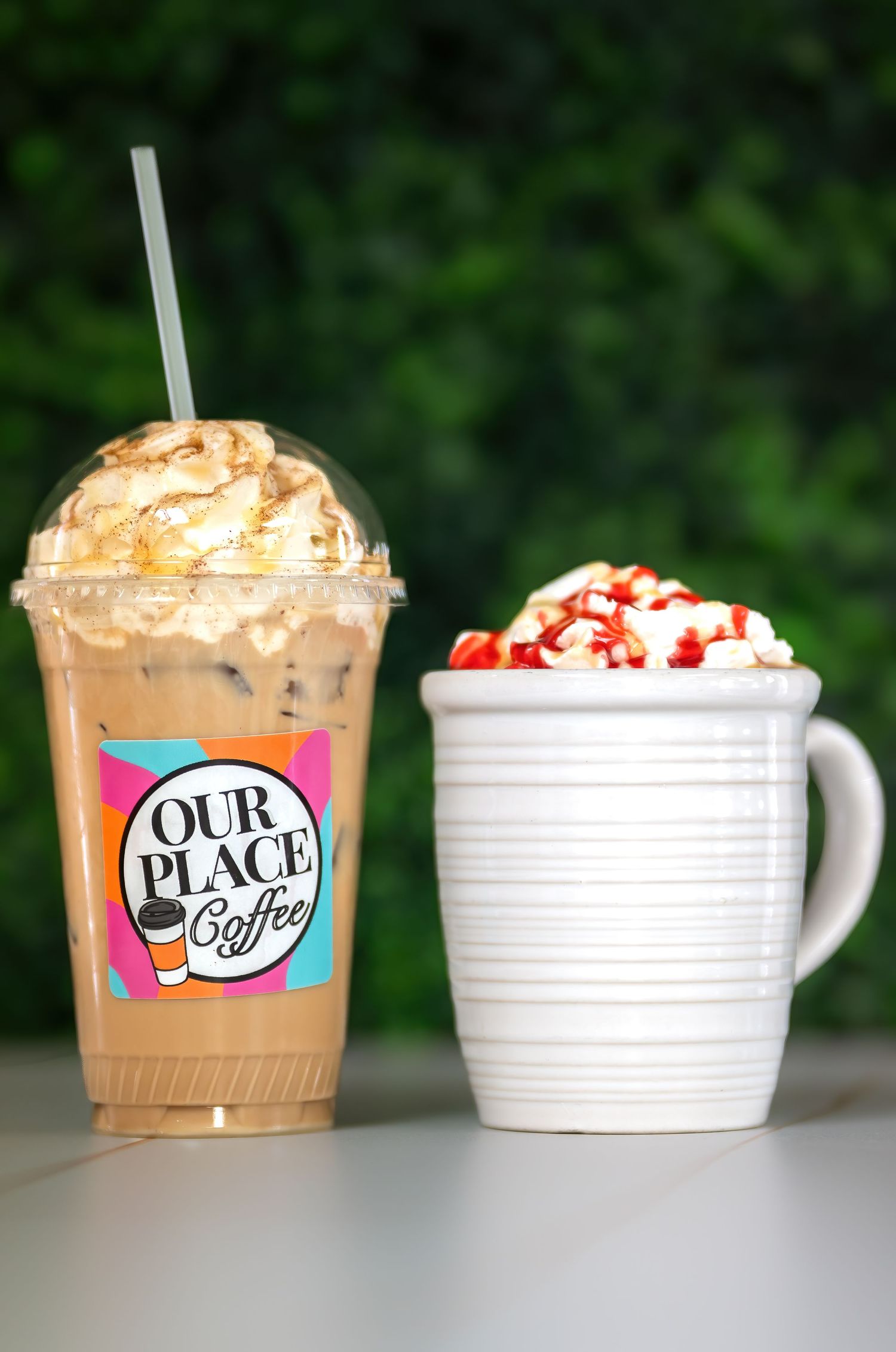Close-up photo of a fresh latte with latte art captured for a Pahrump Nevada coffee shop menu by Oasis Digital.