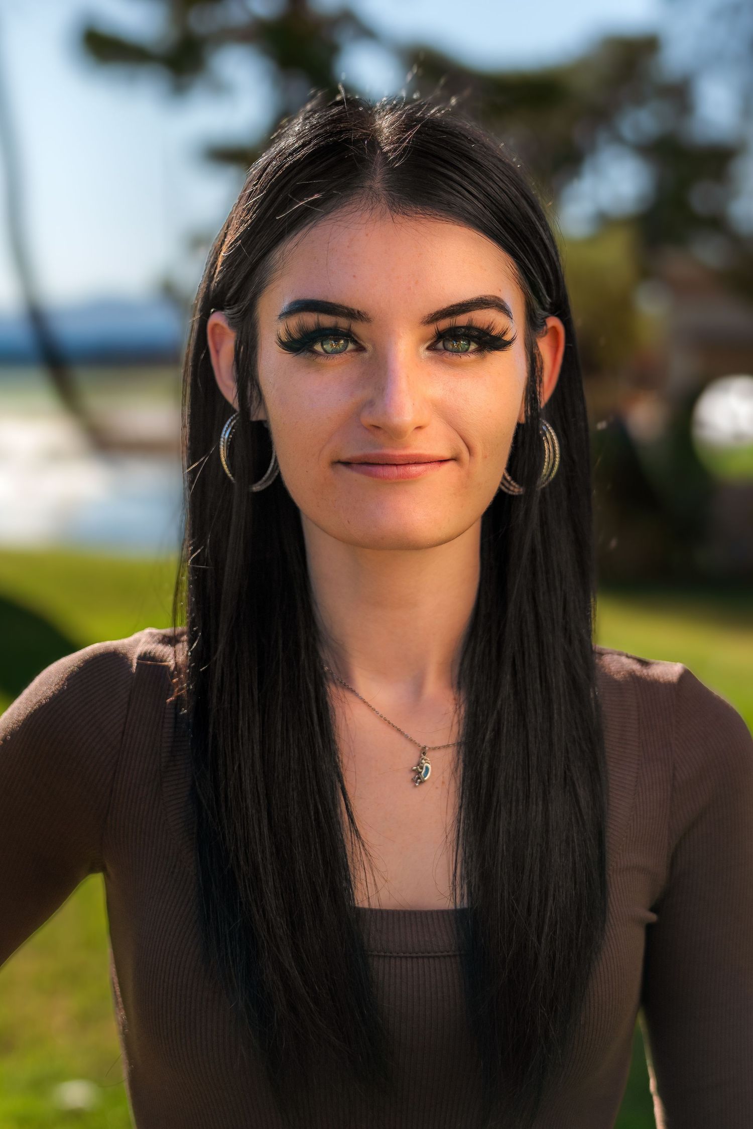 Professional headshot of a real estate agent taken by Oasis Digital for business branding.