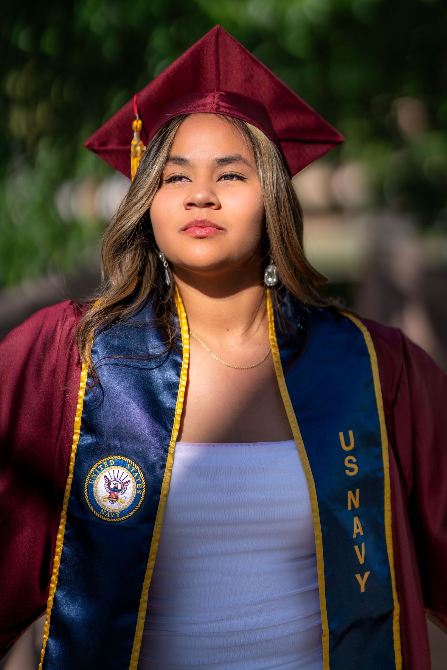 Graduation portrait photography celebrating achievement and milestone moments by Oasis Digital.