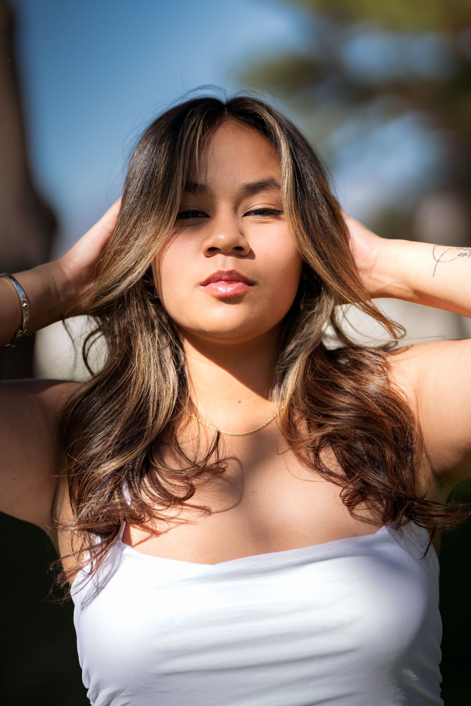 Elegant beauty portrait captured in soft, flattering light by Oasis Digital.