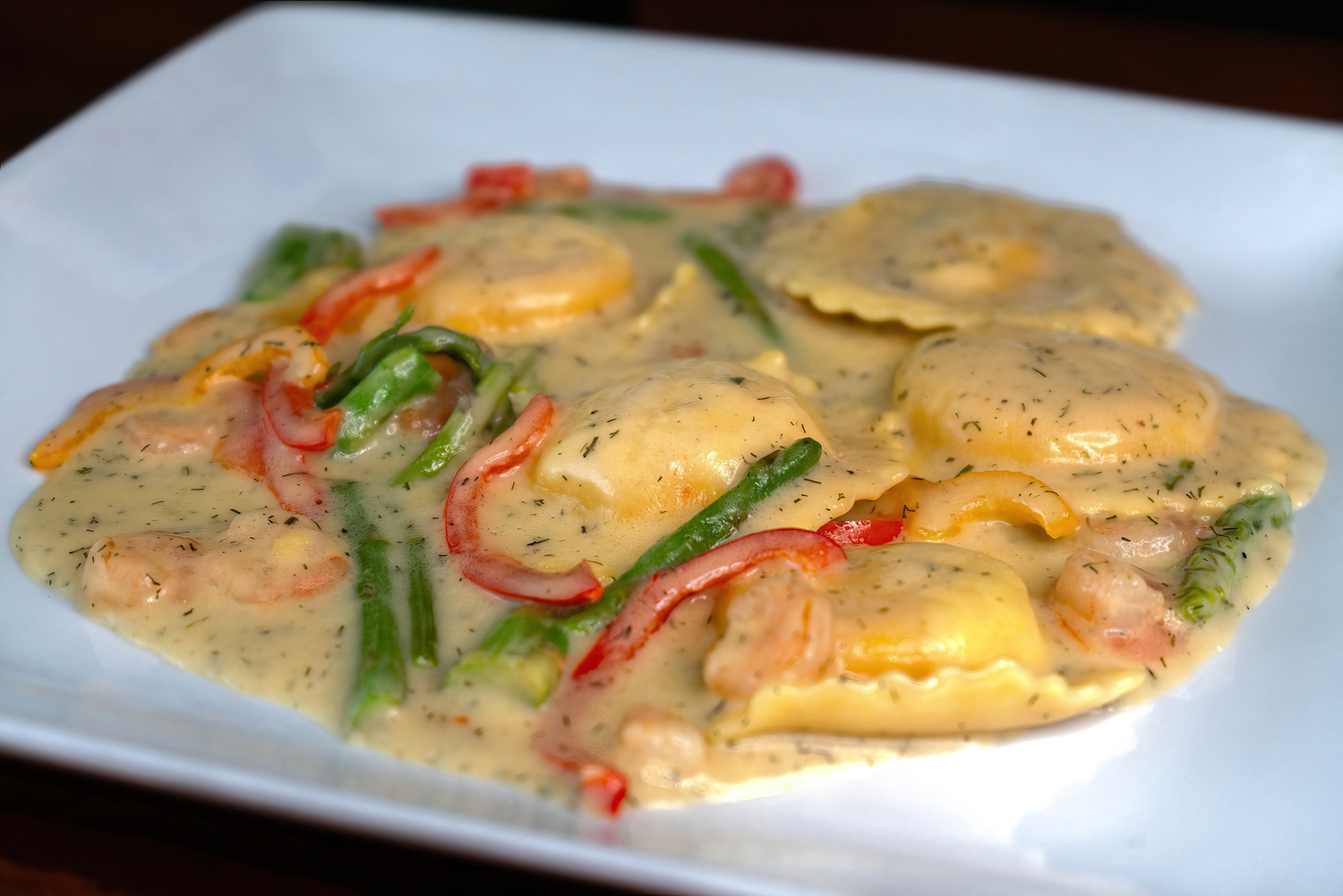 Professional food photography of lobster ravioli plated for a Pahrump Nevada restaurant menu by Oasis Digital.