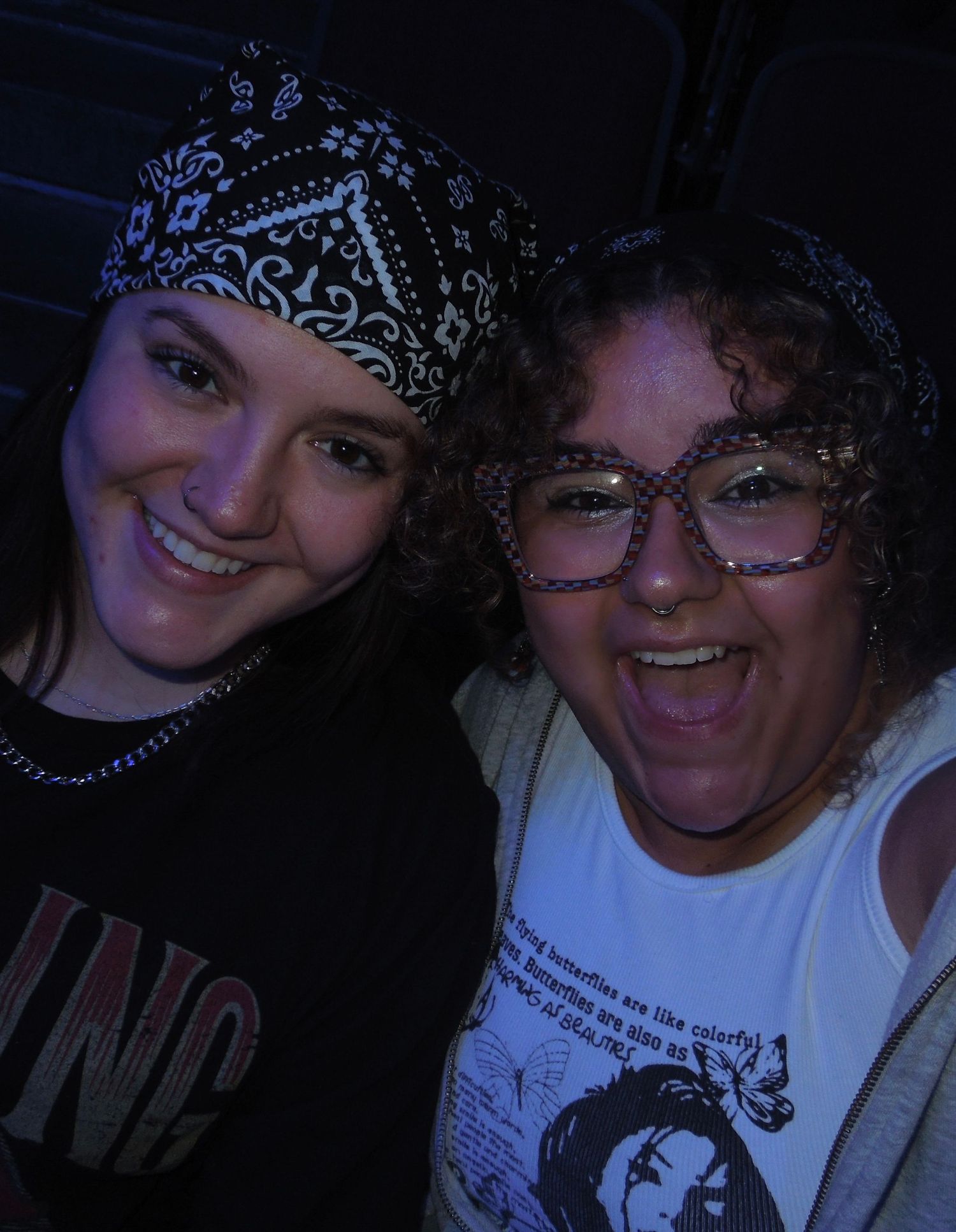 A series of dark nighttime photos showing people posing together with happy expressions.