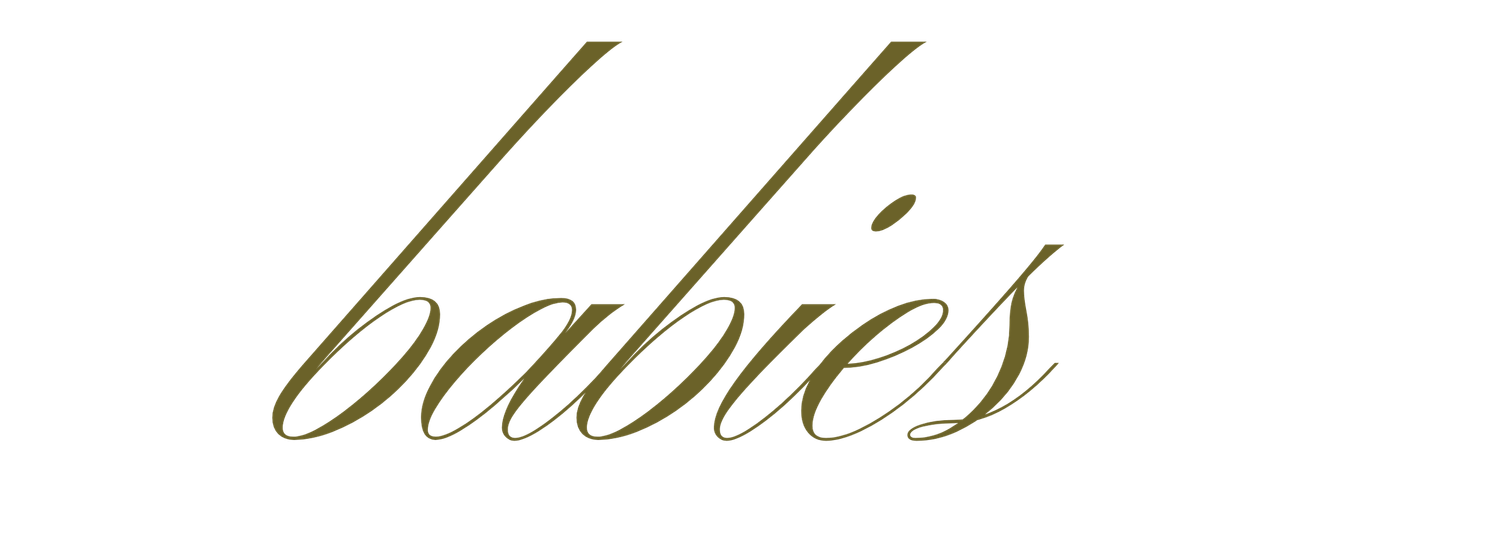 Elegant gold calligraphy text on white paper shows handwritten script and decorative flourishes.