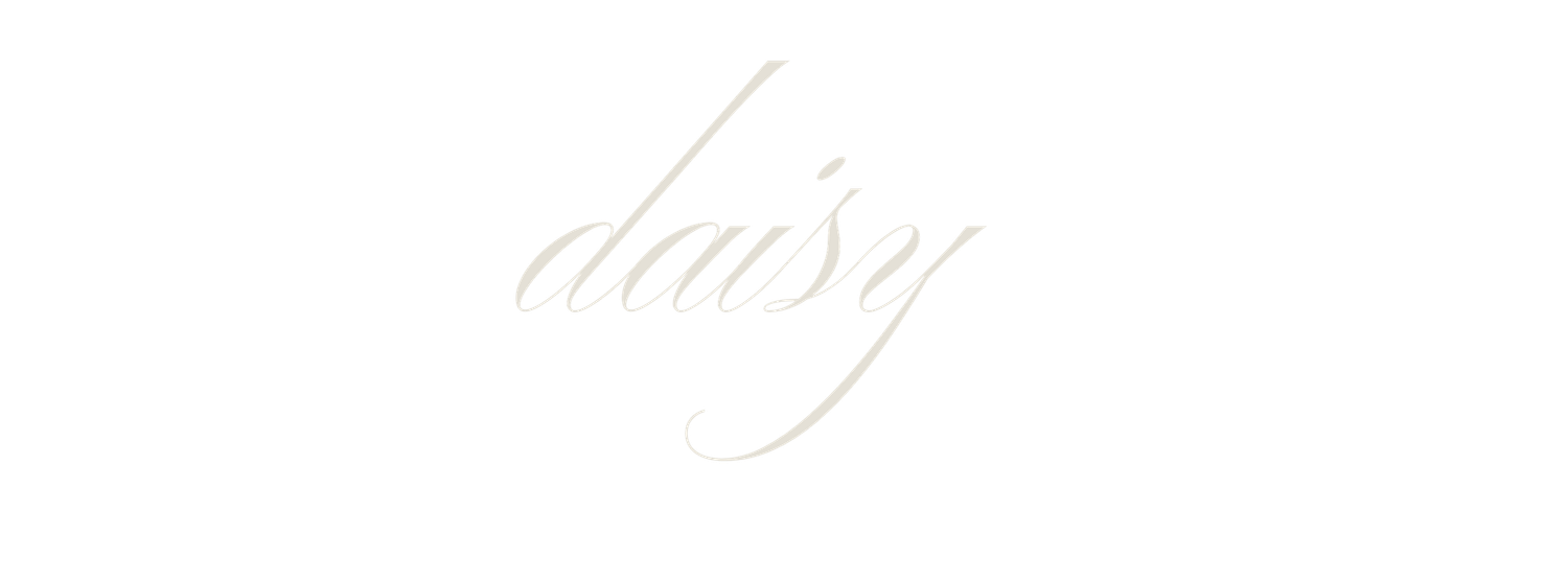 Elegant handwritten cursive text in light gray ink appears on a white background.