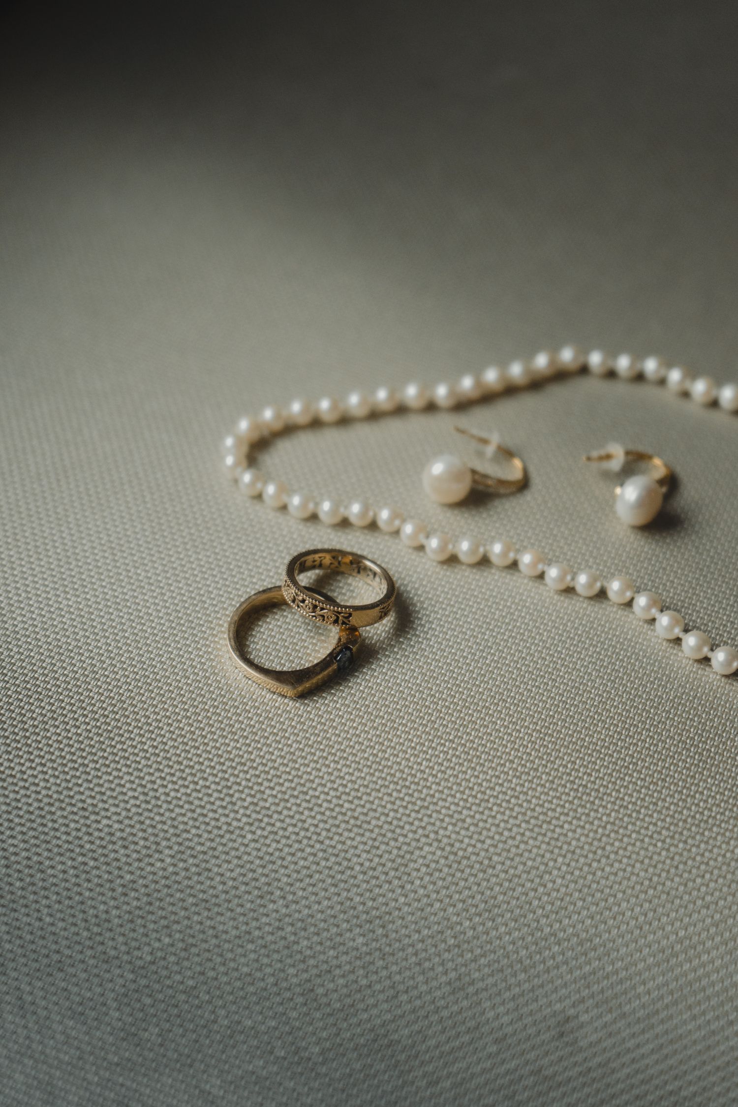 rings and necklace, Cat and Seb Wedding, James Glac Photography, Niagara on the lake, Ontario