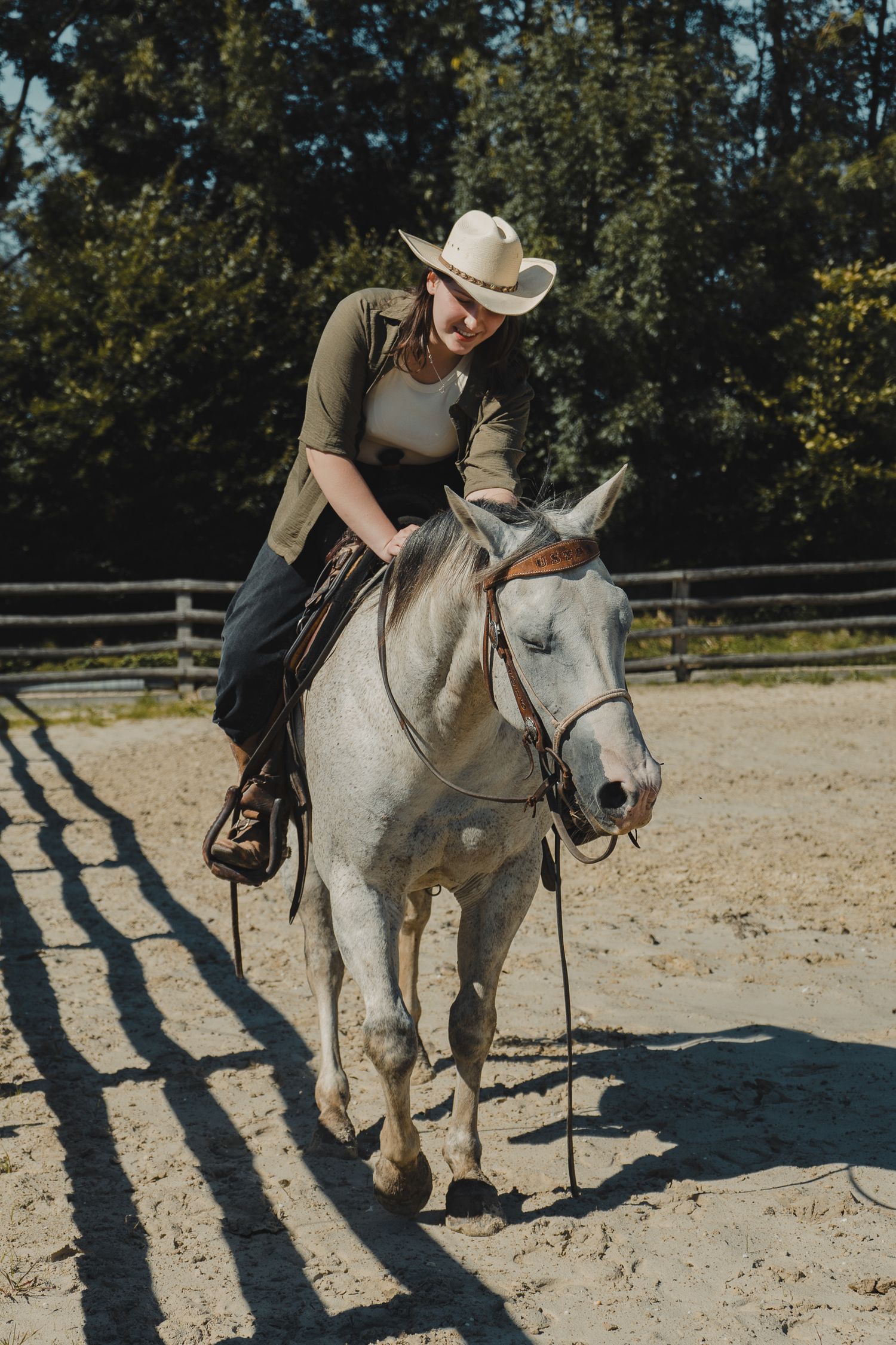 woman riding horse at ranch Branding, Belgium, james Glac Photography