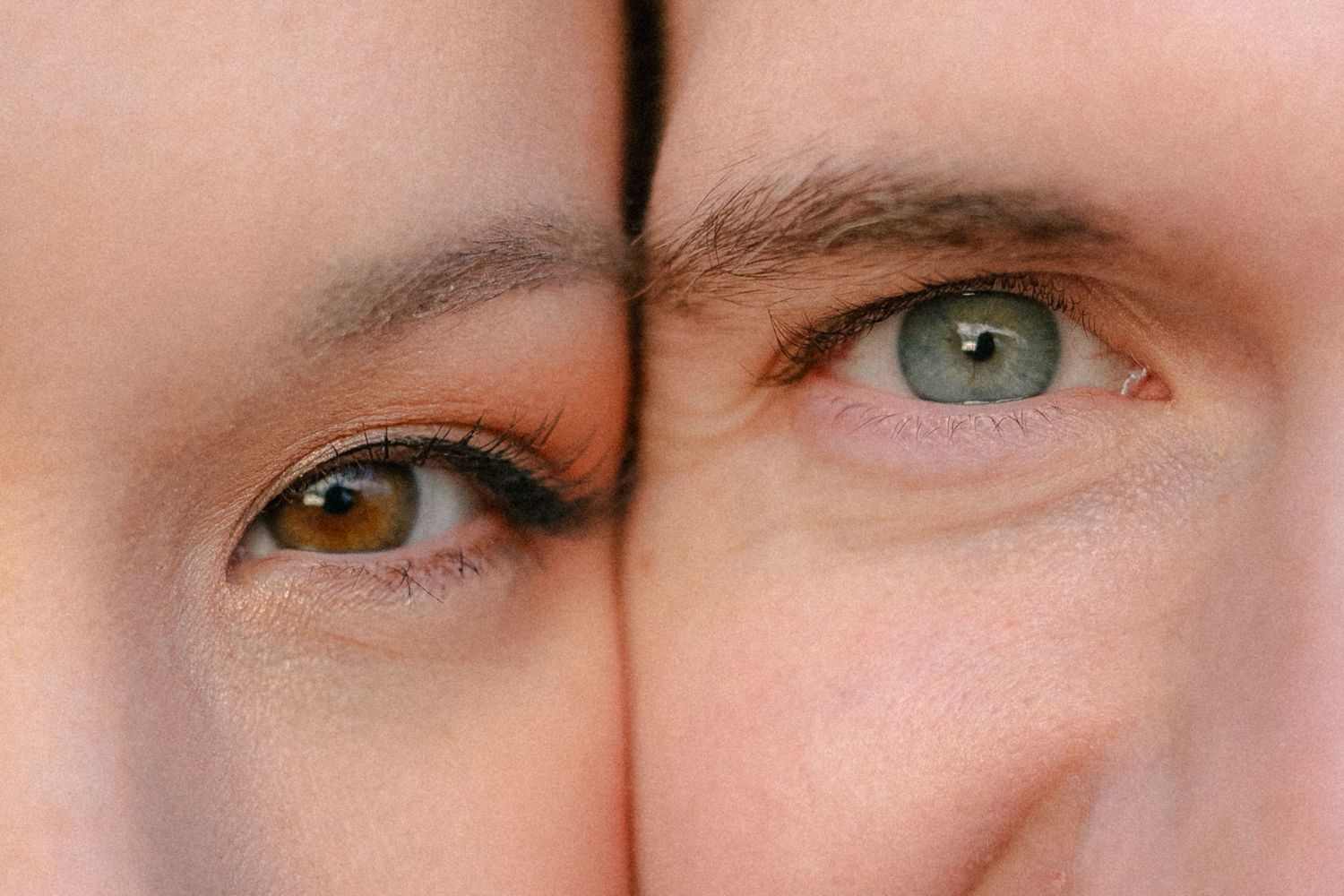 Extreme close-up of eyes showing different colors and expressions.