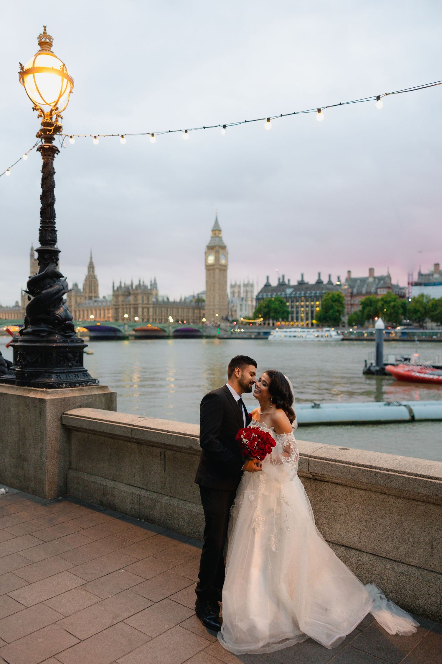 Wedding portraits on London's South Bank with Big Ben and Parliament in the sunset backdrop.