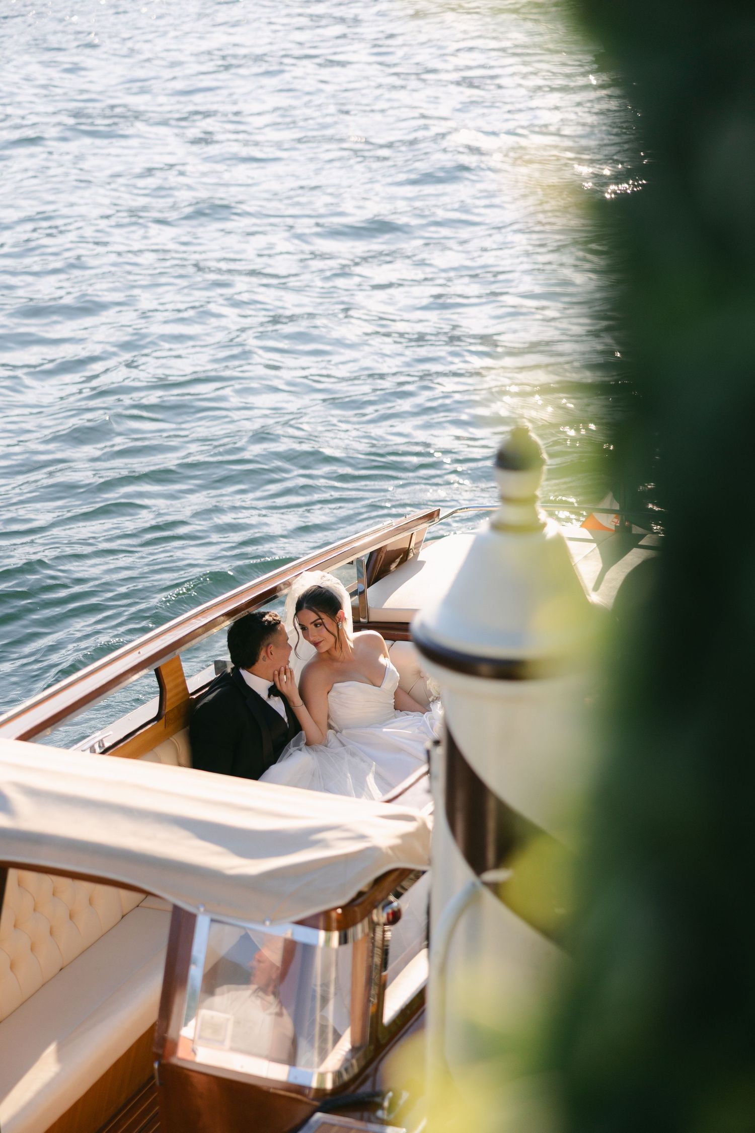 Luxury wooden boat cruising on tranquil Mediterranean waters.