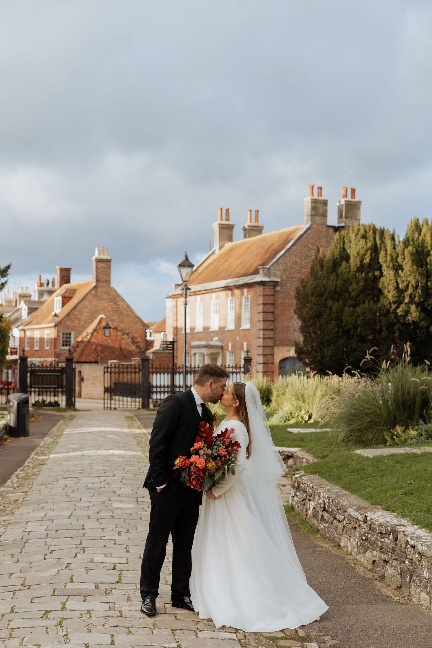 A wedding couple at the priory Christchurch wedding photographer
