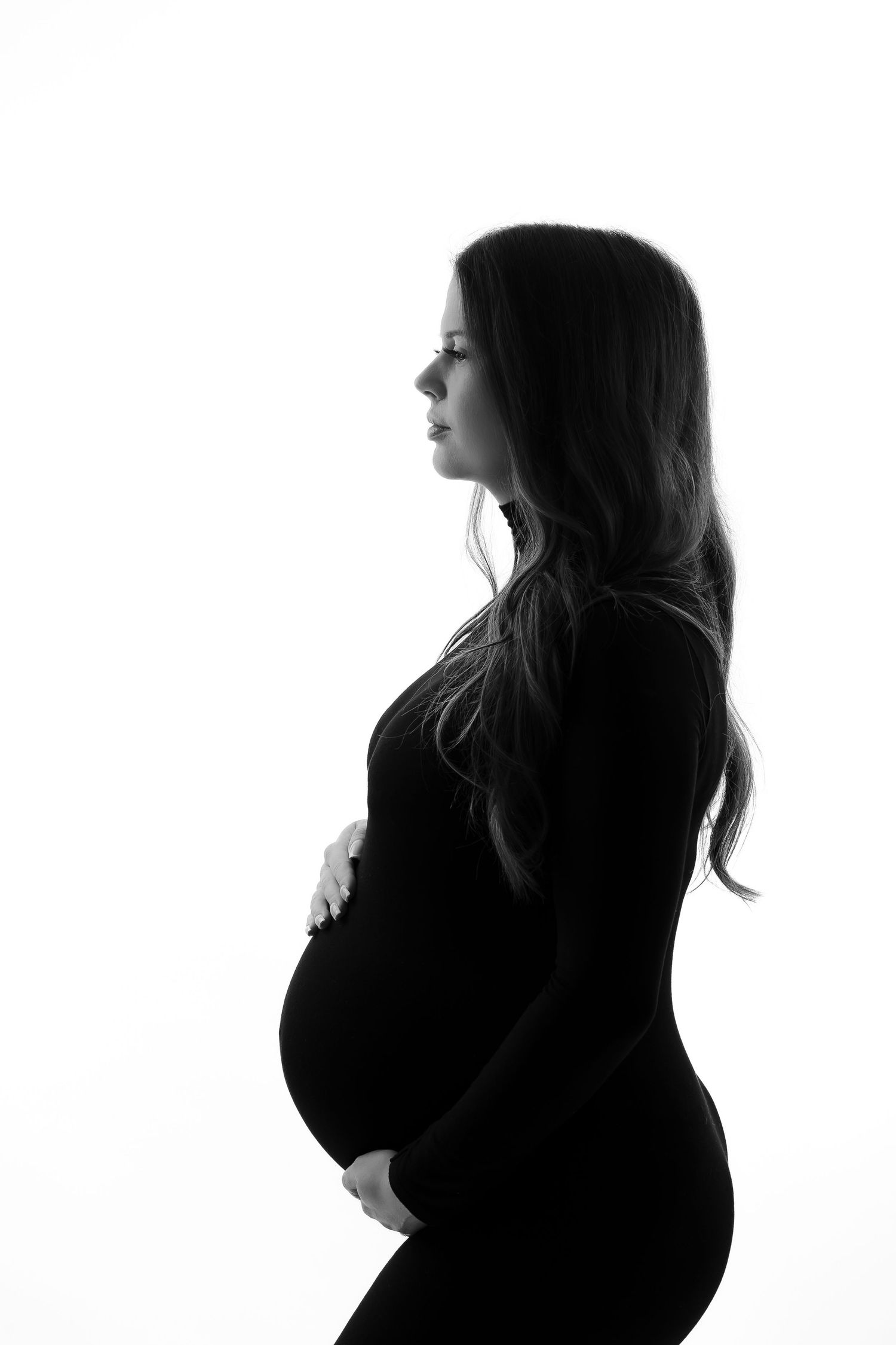 Classic black and white maternity silhouette profile.
