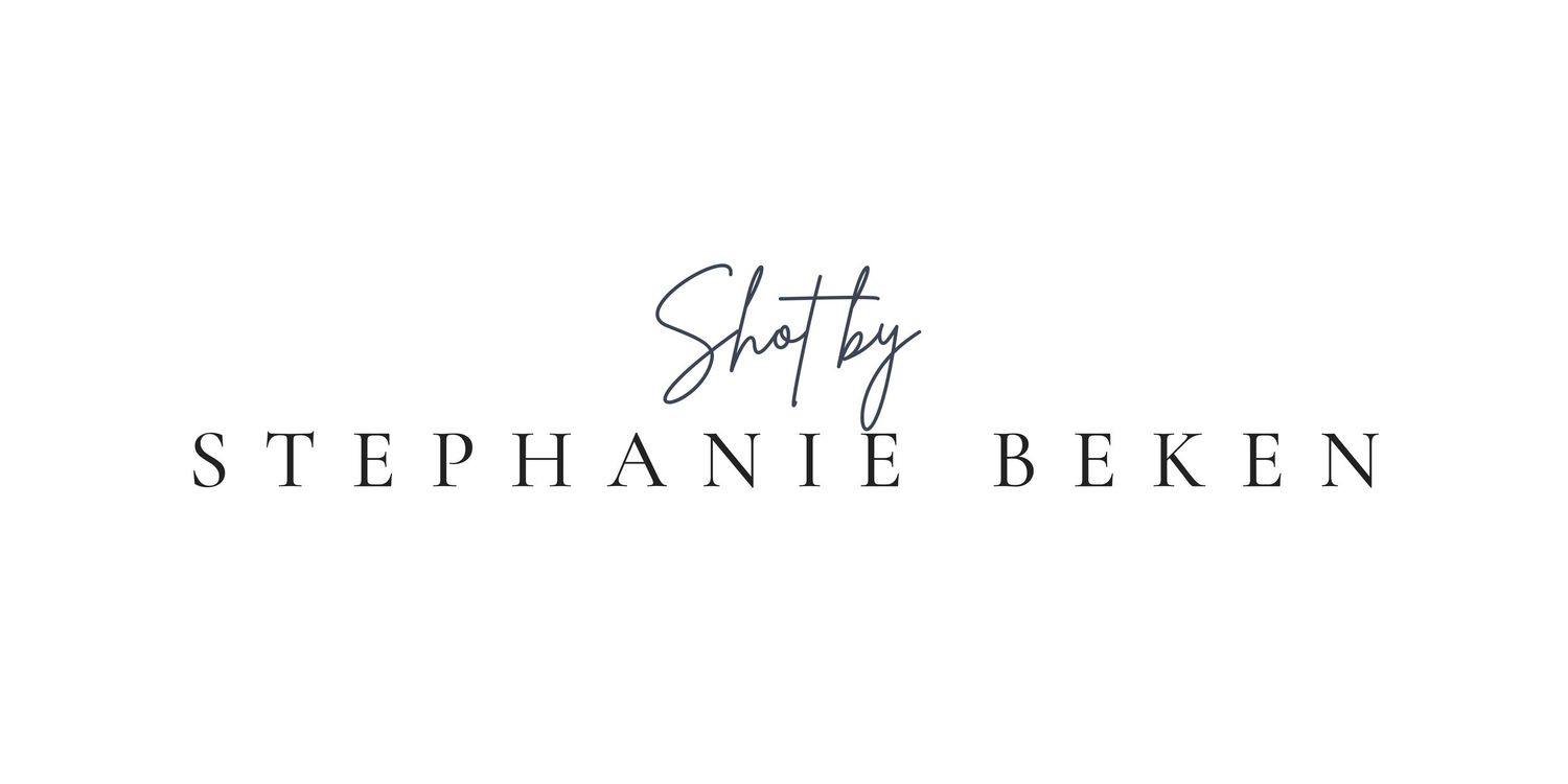Elegant signature text design in black on white background.