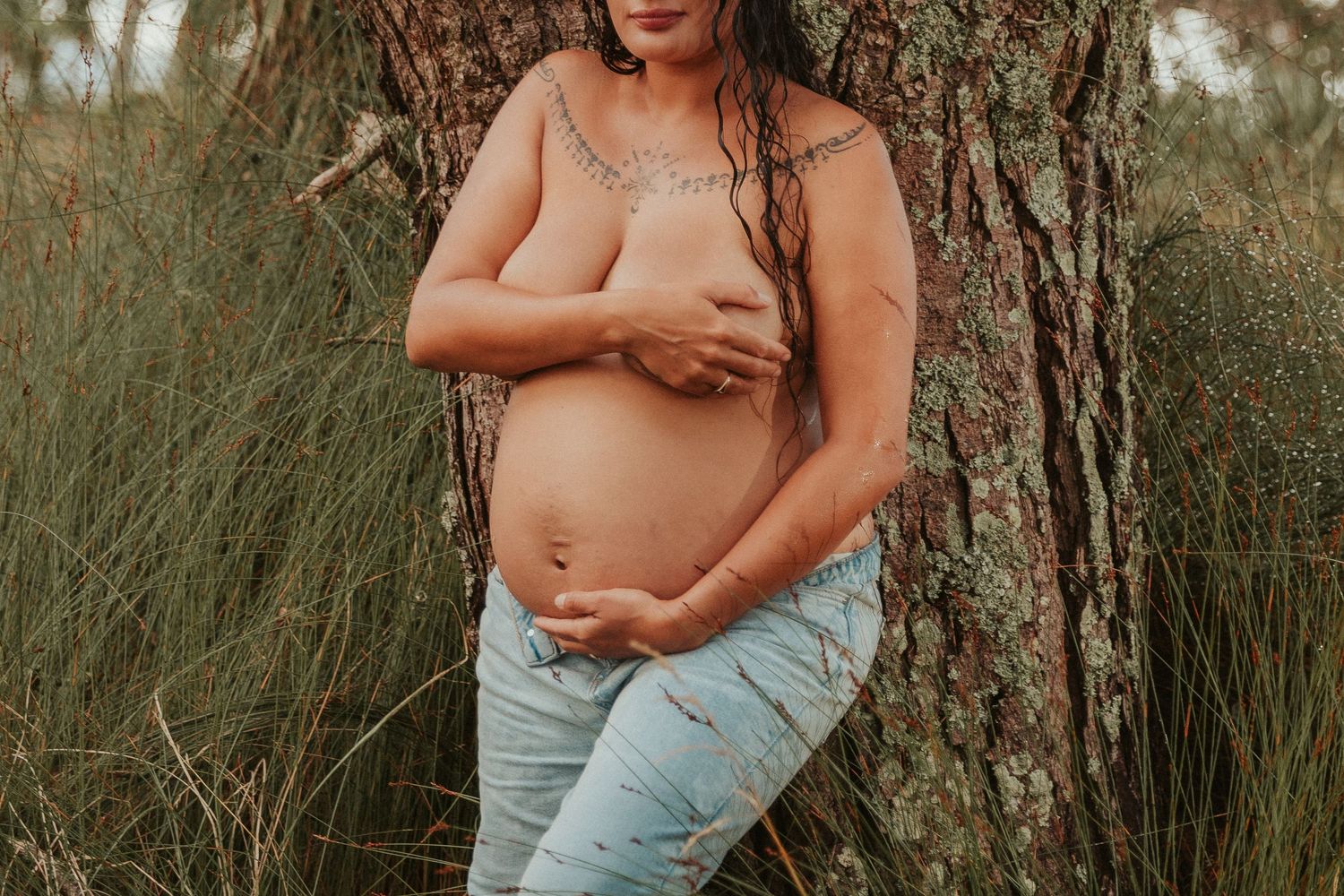 A collection of intimate outdoor maternity photos featuring a woman in jeans and crop top against a natural backdrop.