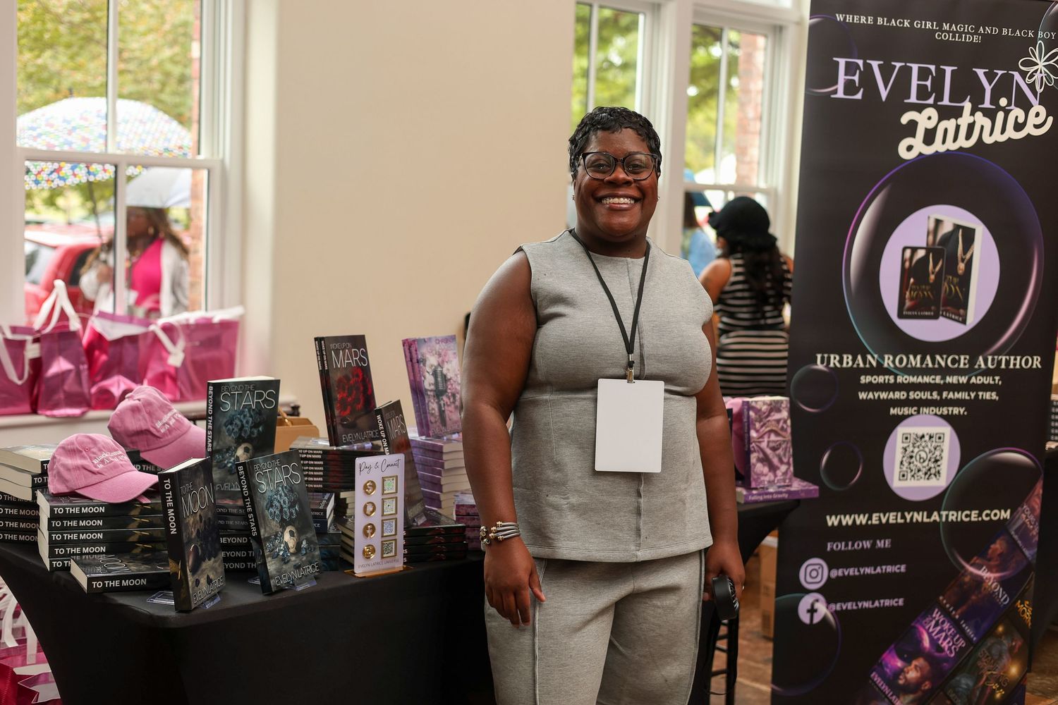 Small business owners display their products and services at a local vendor market event.