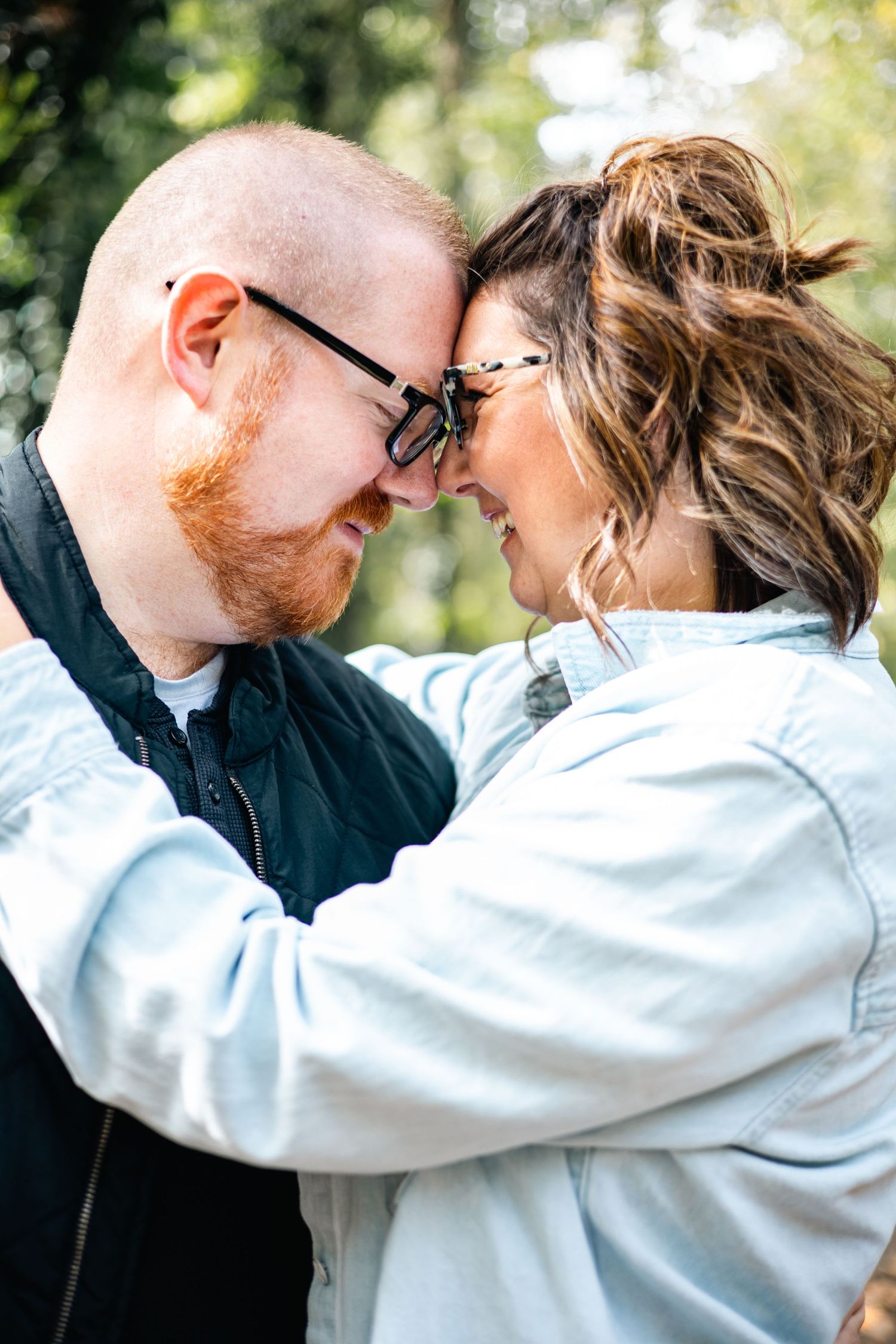 A romantic couple embraces outdoors in a series of intimate close-up shots showing tender moments together.