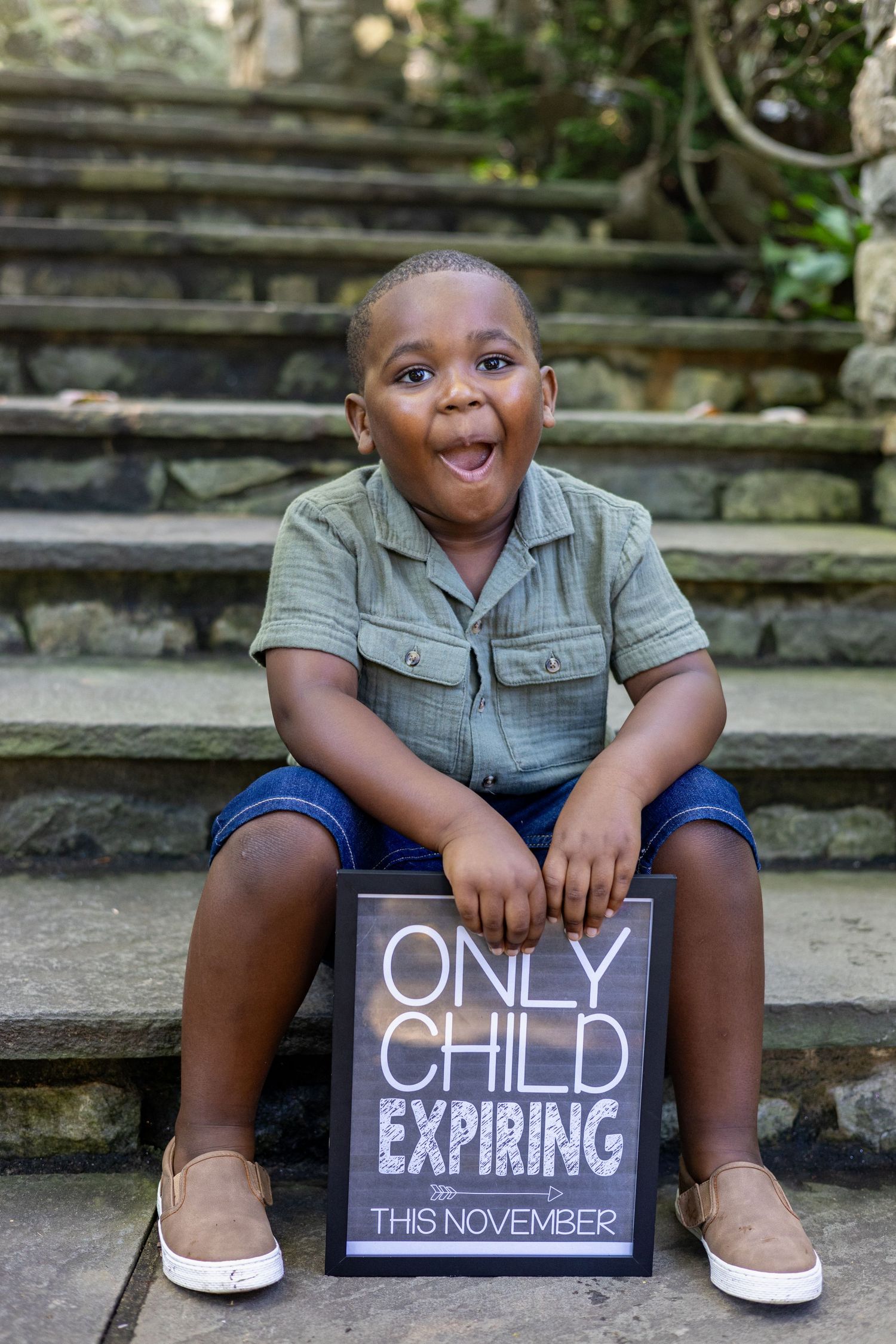 A creative photo series shows someone sitting on steps with signs reading 'Only Child Expiring This November'.