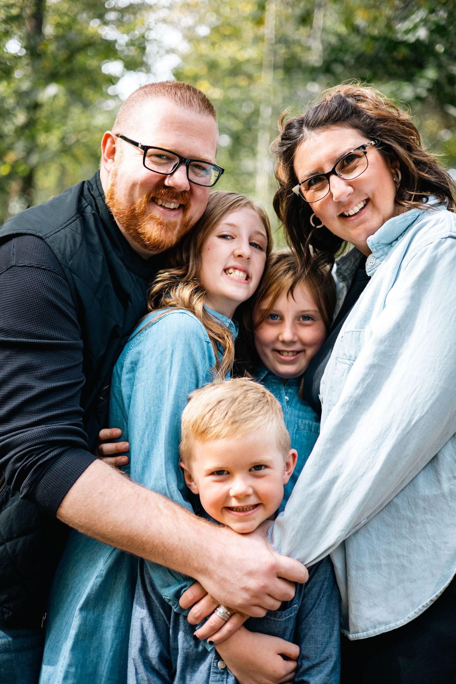 A series of candid family photos showing joyful embraces and laughter in an outdoor setting with natural greenery.