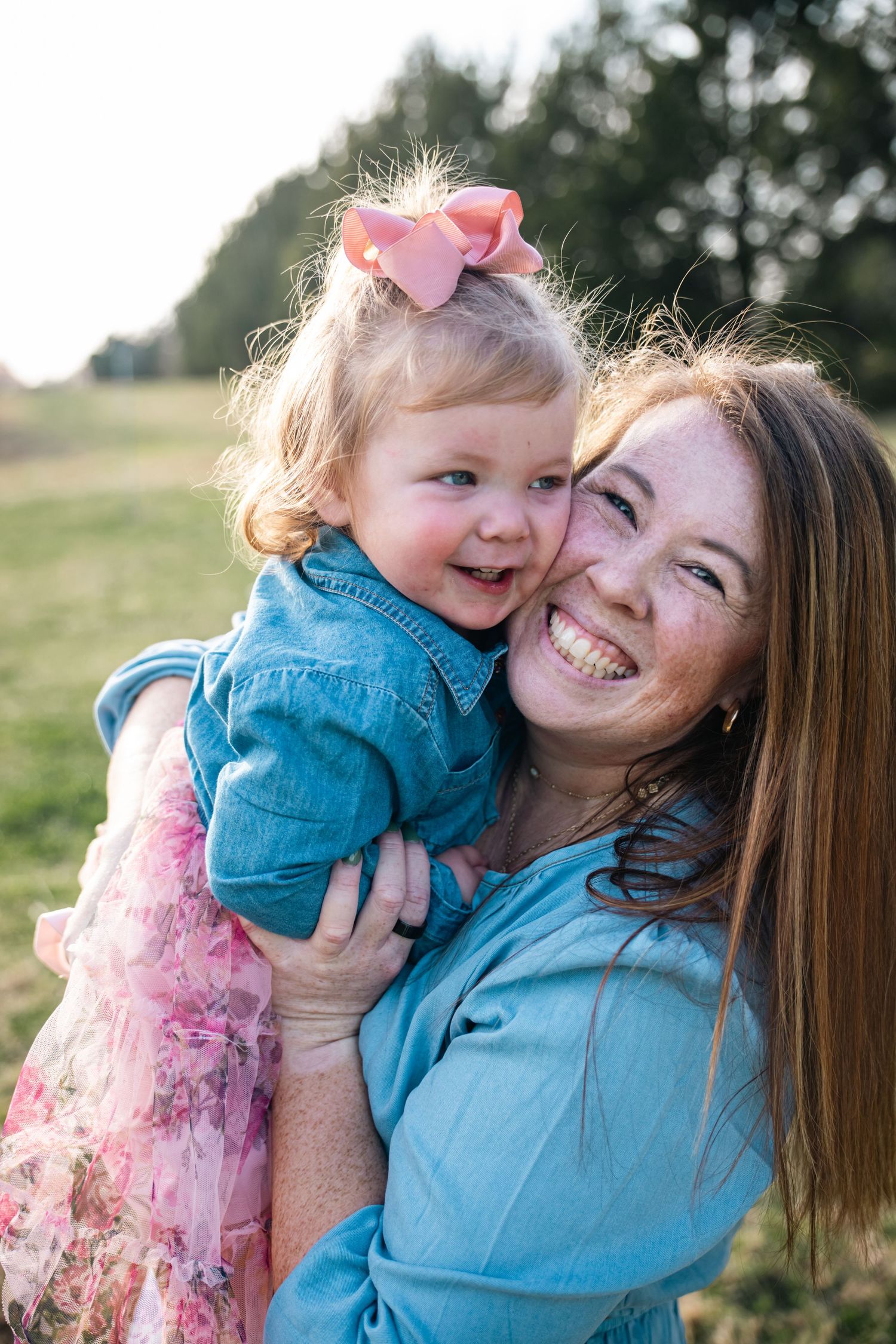 A joyful moment captured in a series of three photos showing affectionate embraces outdoors in natural lighting.