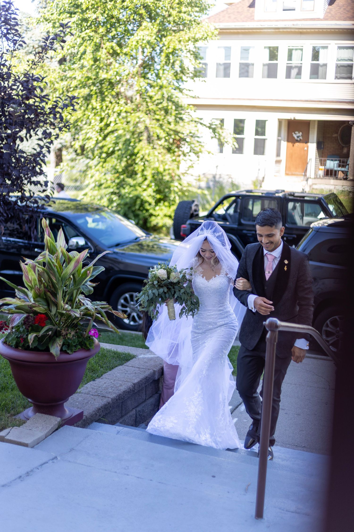 Bride and groom dancing together outdoors during Minneapolis wedding reception