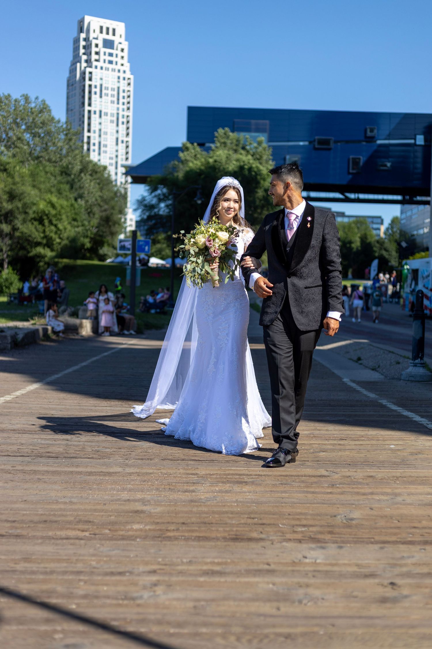 Bride and groom walking outside together after Minneapolis wedding ceremony