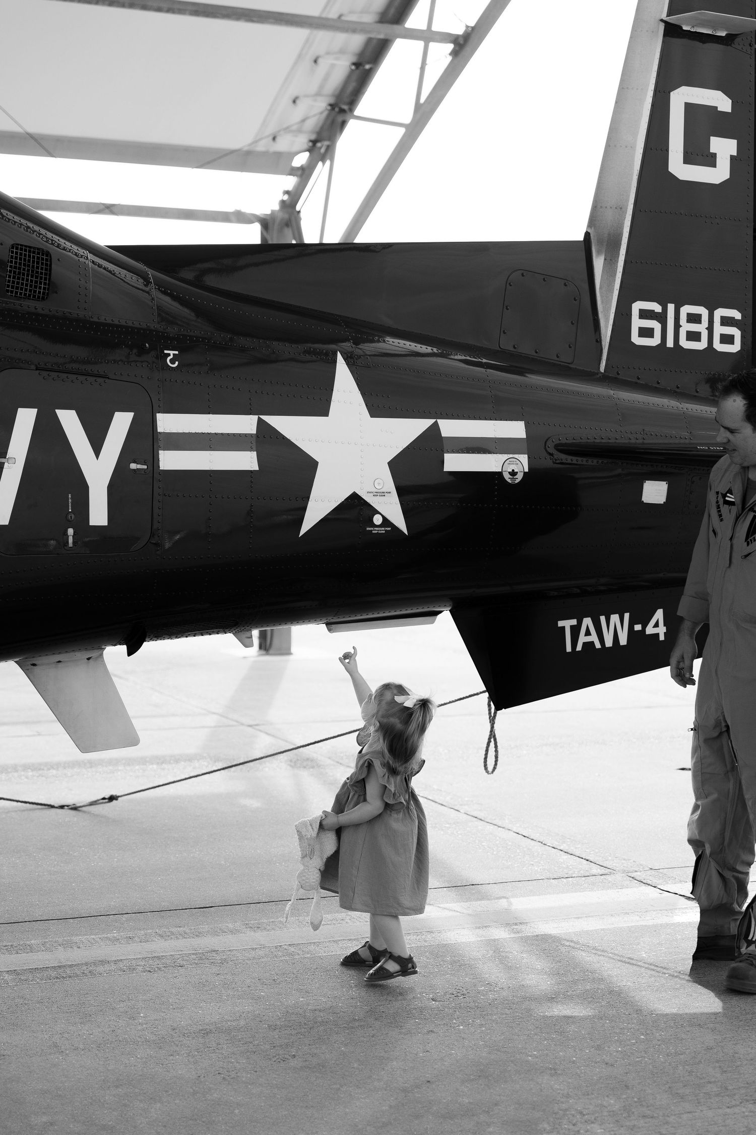 Norfolk Flight Line Session Photographer for military service members and their families. Winging Ceremonies, Retirement, Homecomings