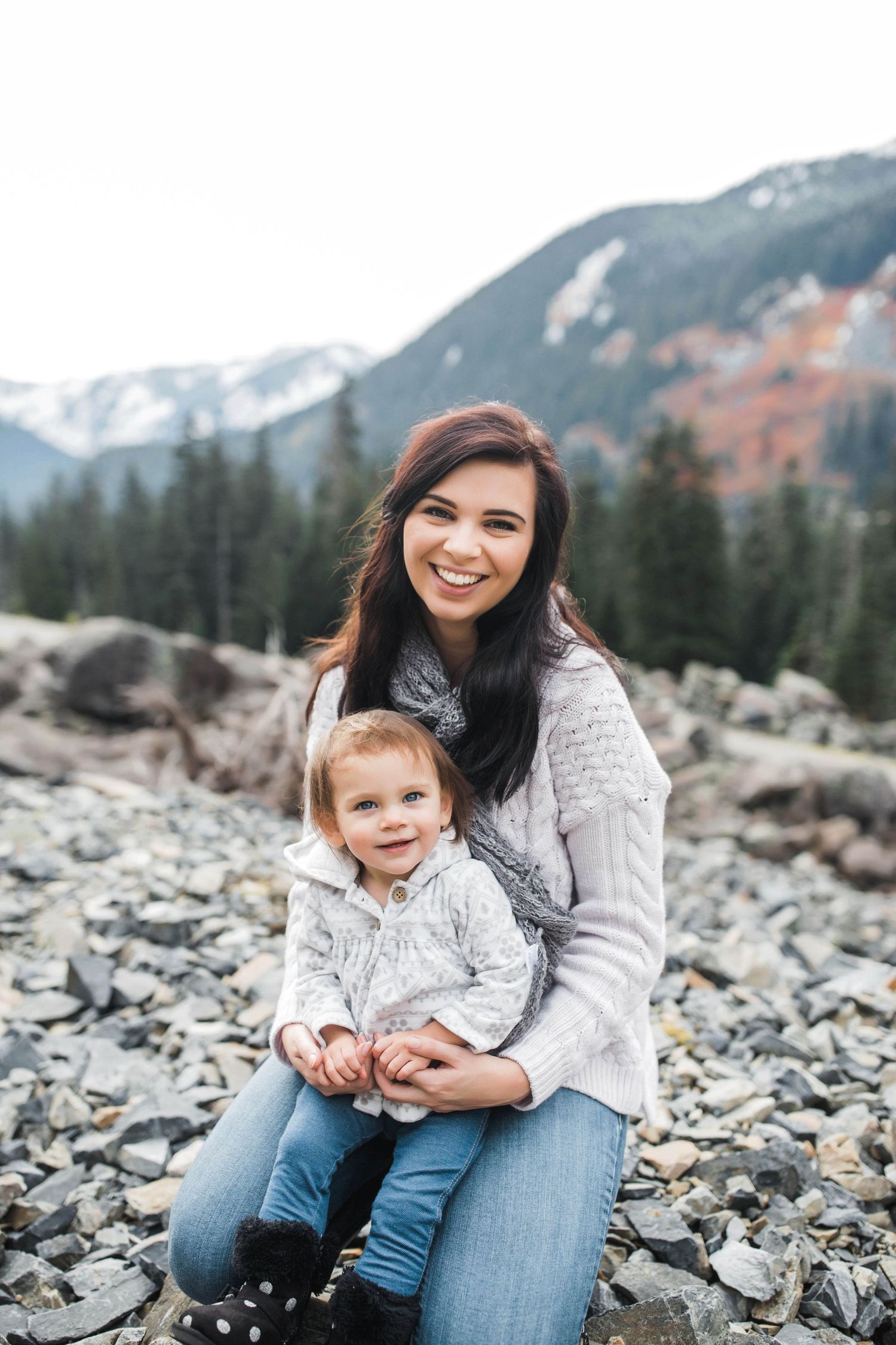A portrait of mom and baby in the mountains near Seattle.