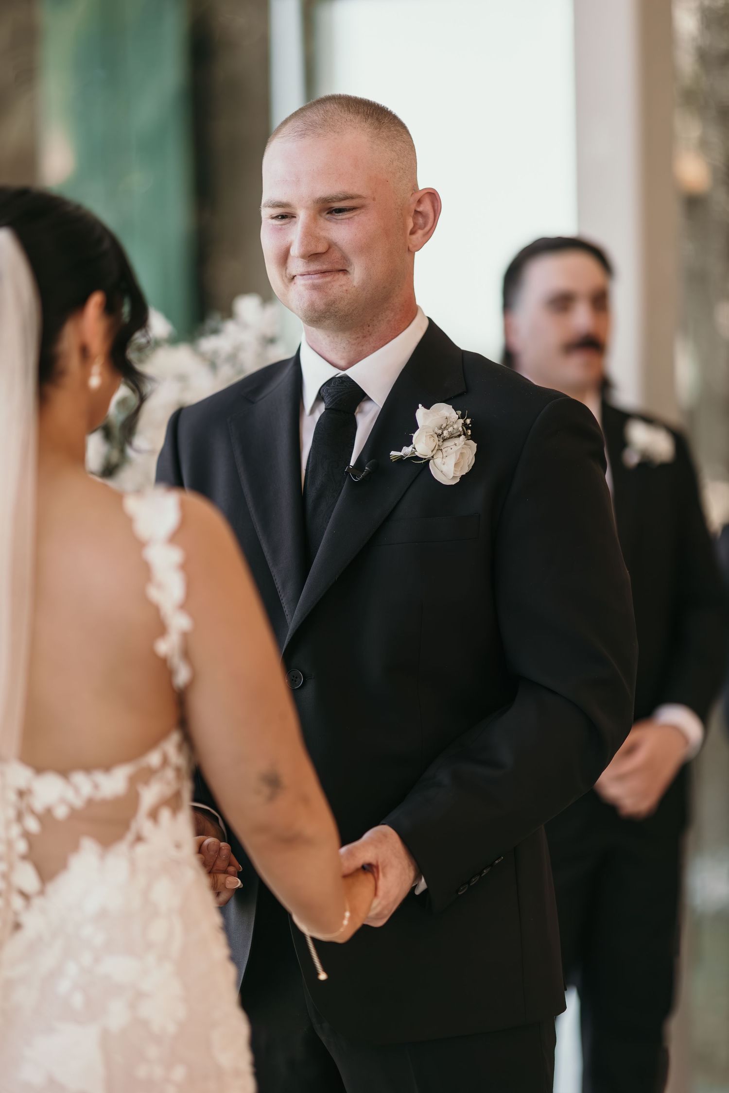 A sequence of wedding ceremony moments showing emotional reactions between the bride and groom during their vows.