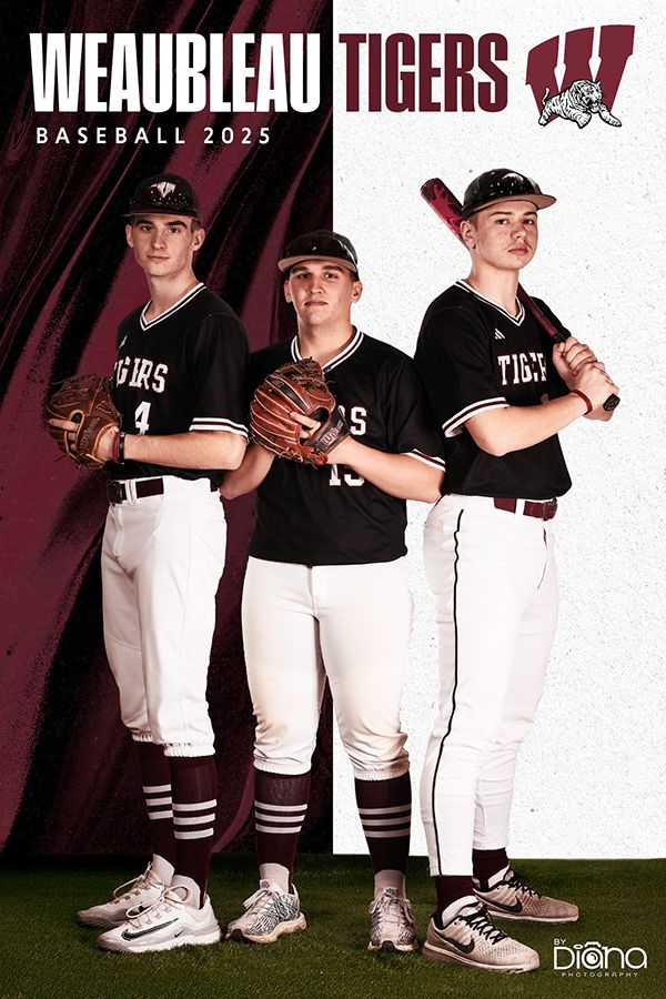 Youth baseball team photo featuring players in black and white uniforms against dark background.