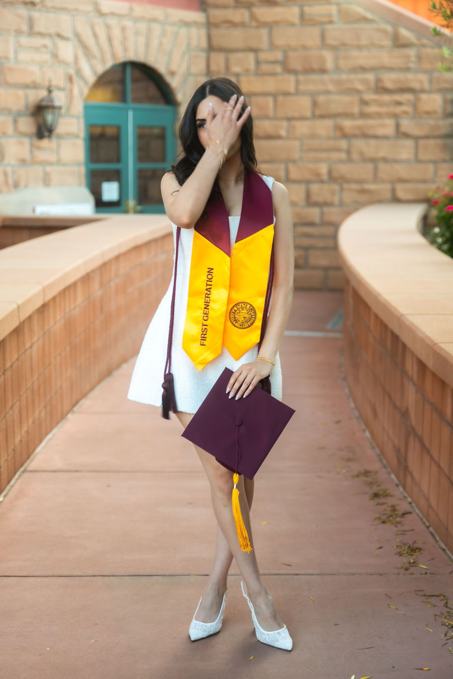 woman posing in her regalia