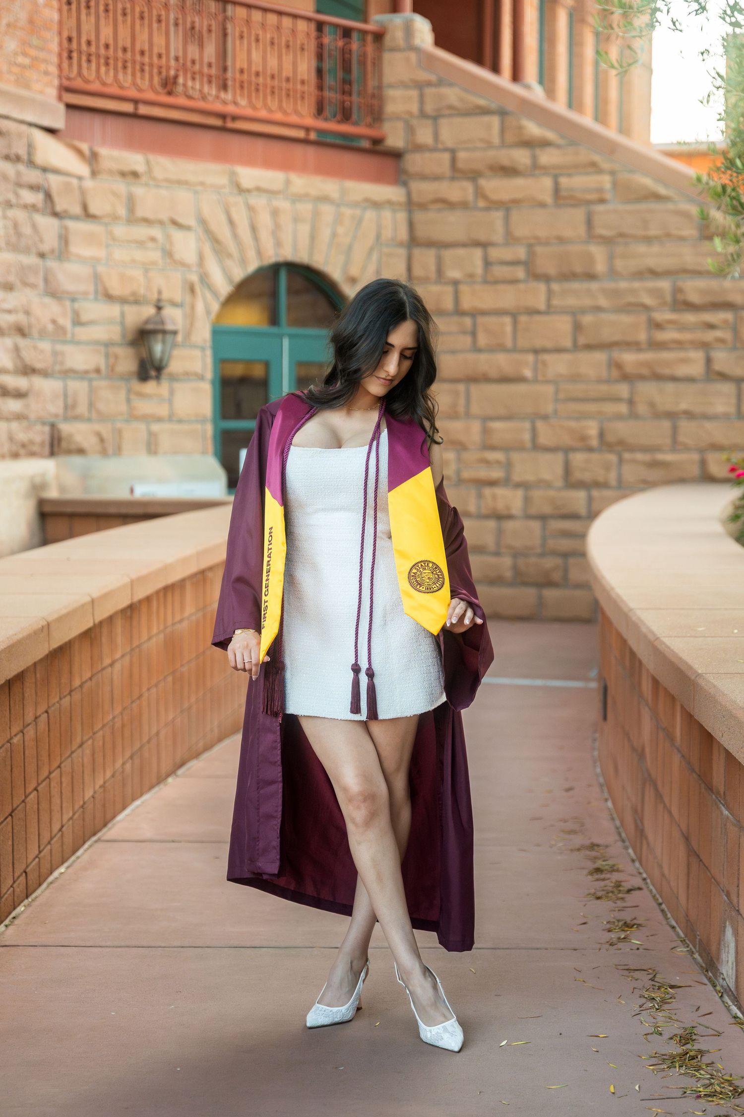 woman posing in her regalia