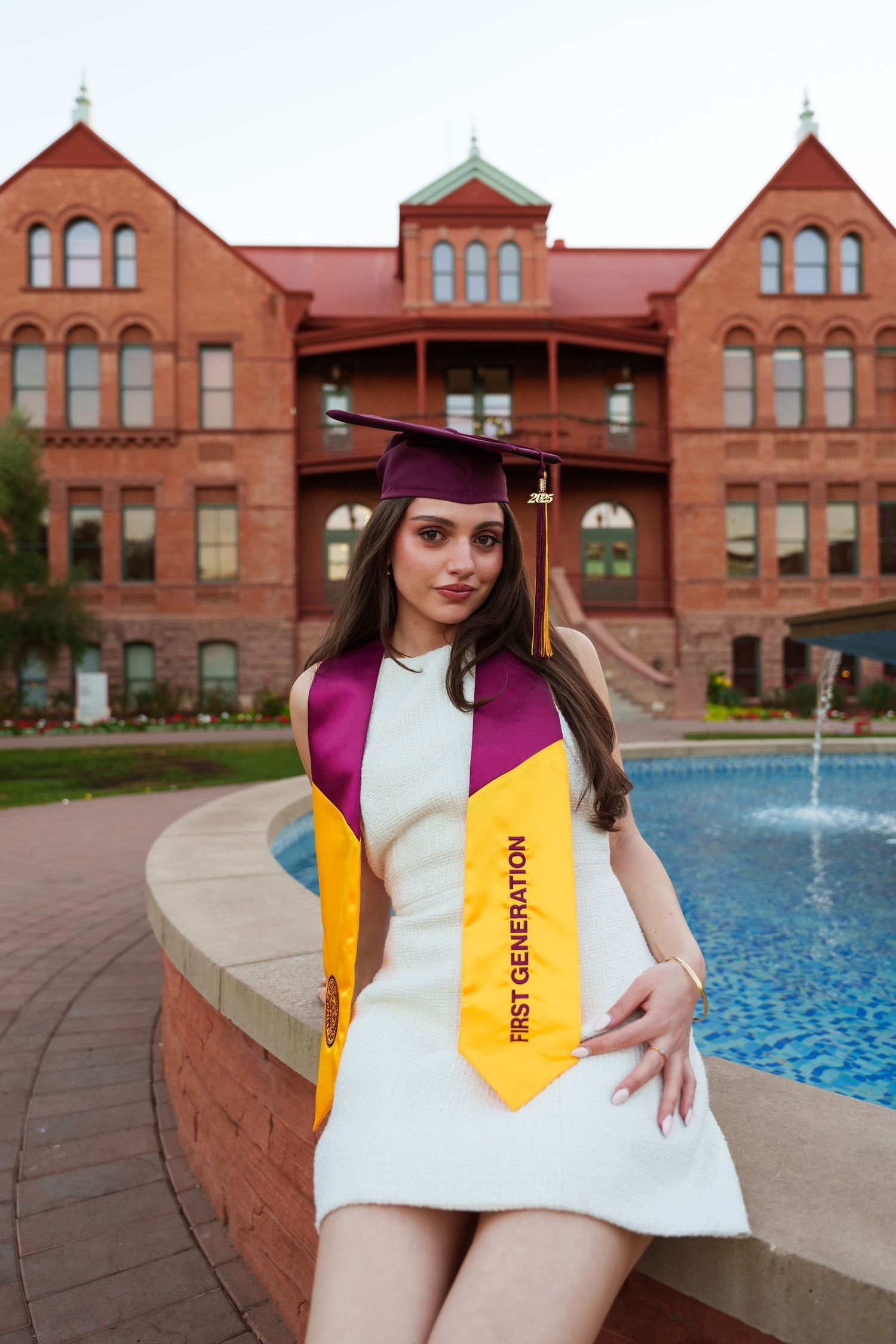 girl posing in front of Old main building at the ASU tempe campus