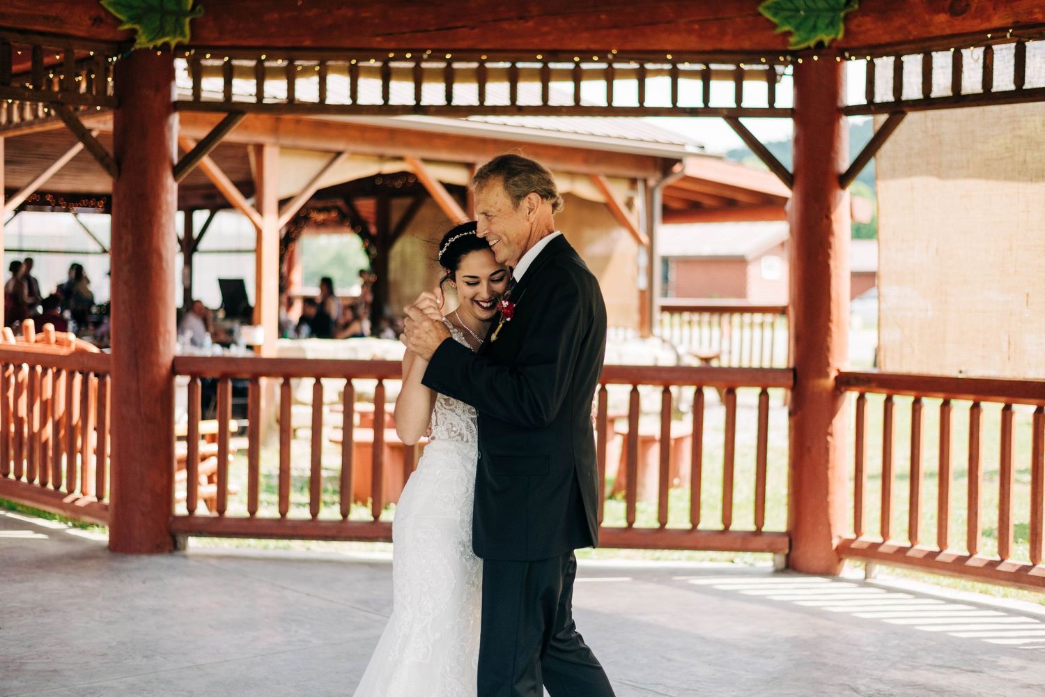 bride and grandfather dancing at wedding reception. father daughter dance.