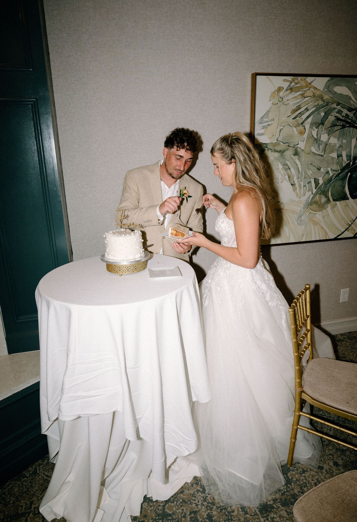 Couple cutting cake on their wedding day on Amelia Island, Florida