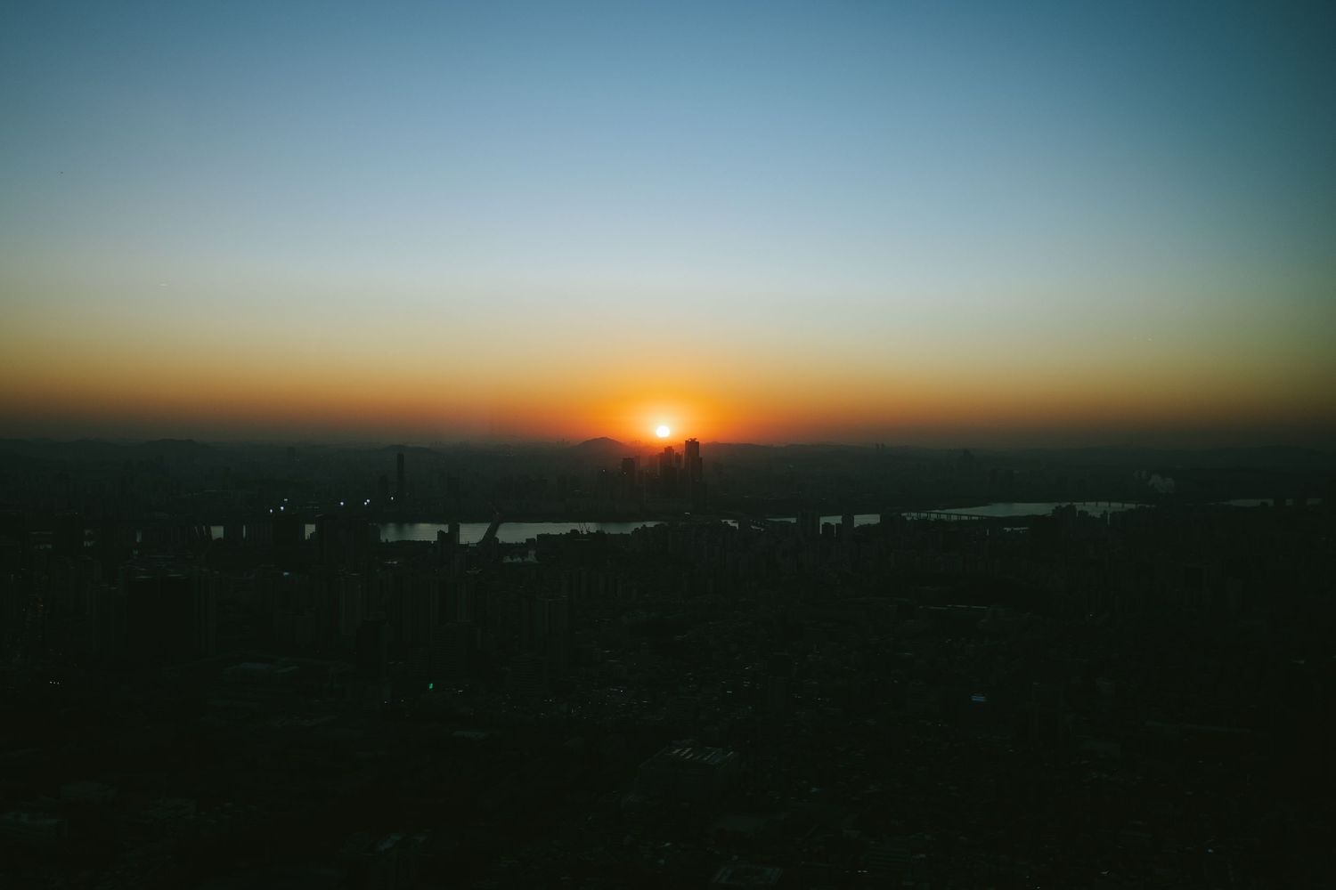Travel photo taken at sunset at the top of N Seoul Tower in Seoul, South Korea